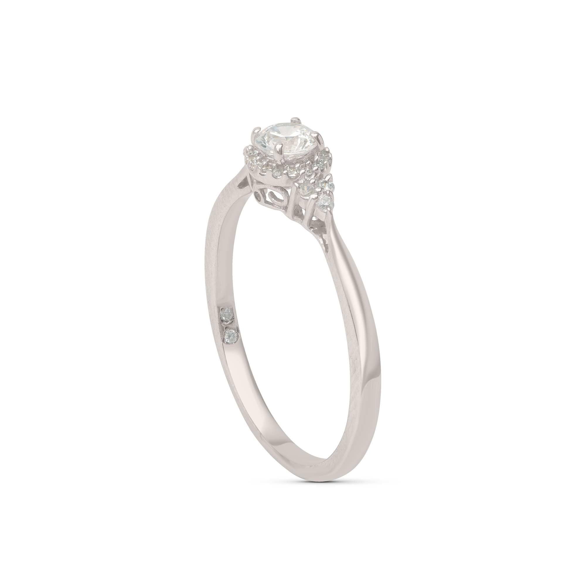 Beautifully studded with 25 brilliant natural white diamonds in prong, micro-pave setting and designed in 18-karat white gold. The diamonds are graded H Color, I1 Clarity. 

Metal color and ring size can be customized on request. 

This piece is