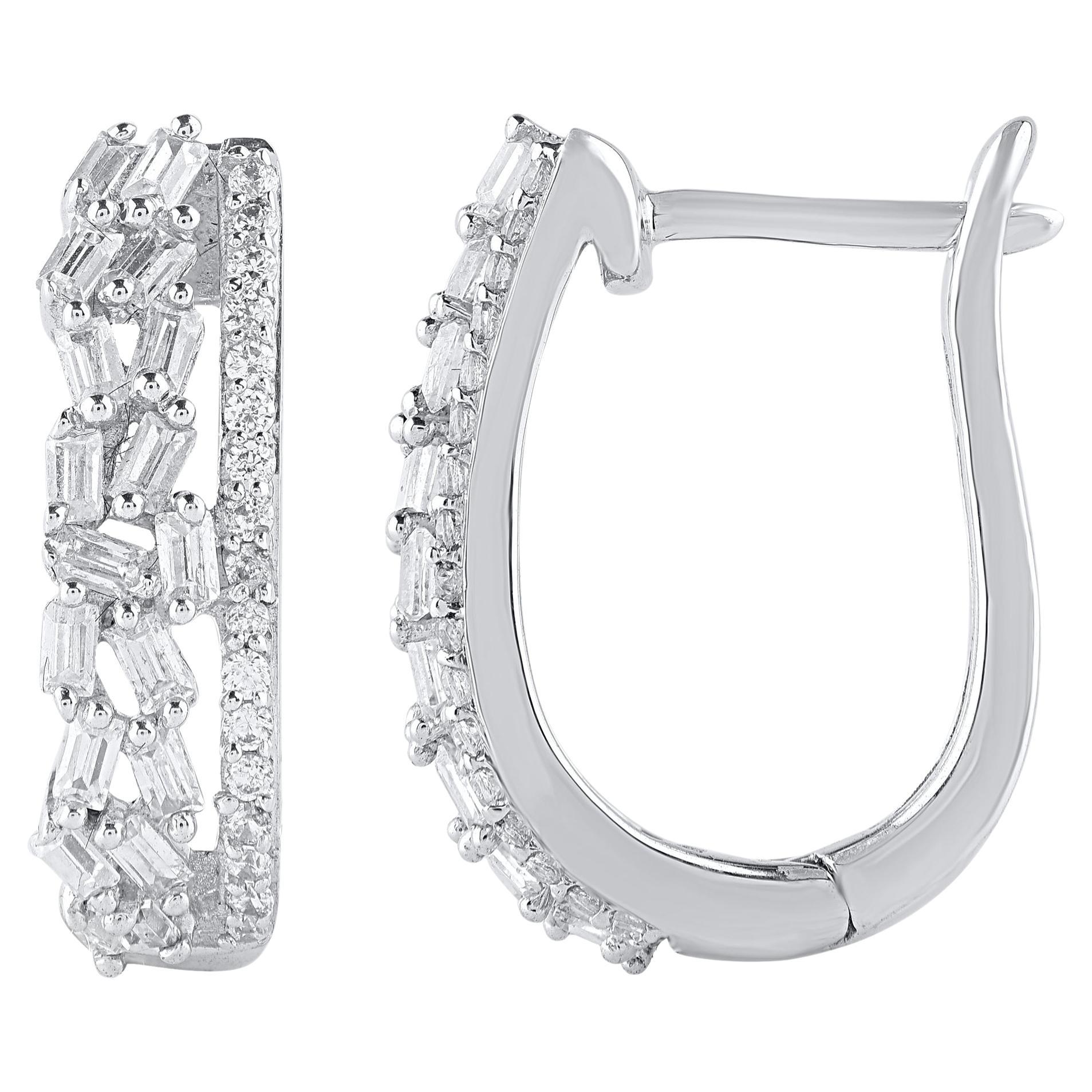 Bring charm to your look with this diamond hoop earrings. This earring is beautifully designed and studded with 70 single cut round diamond and baguette diamonds set in prong setting. We only use natural, 100% conflict free diamonds which shines in