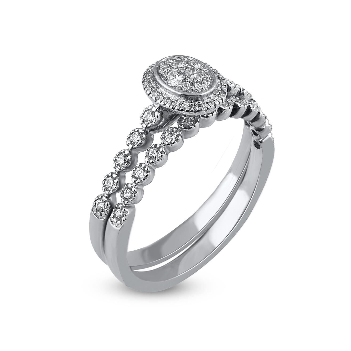 Let your love shine through this beautiful diamond bridal set. Crafted in 14 Karat white gold. This wedding ring features a sparkling 59 brilliant cut and single cut round diamond beautifully set in prong, pave and bezel setting. The total diamond