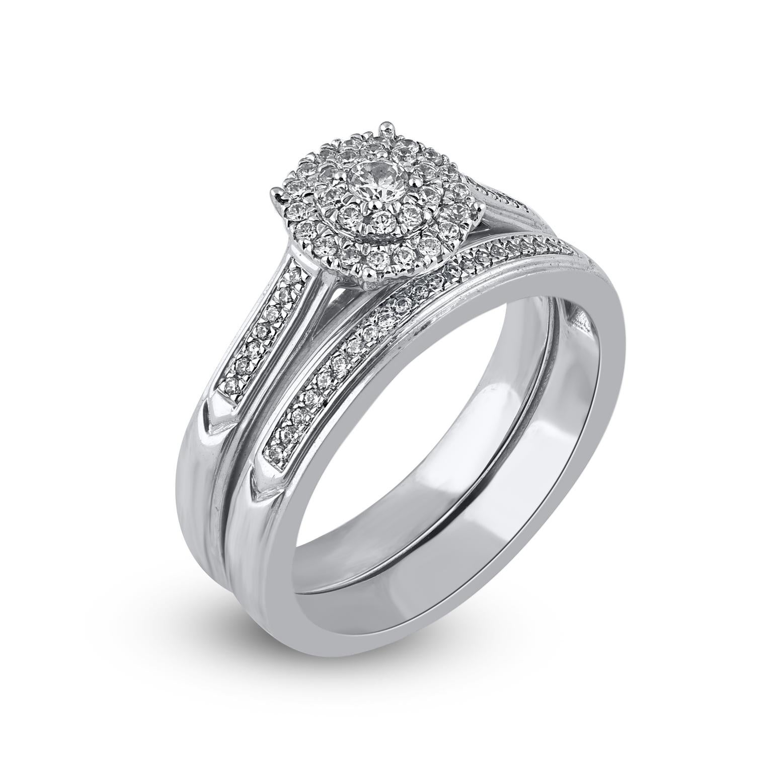 Express all the love you hold in your heart with this cluster diamond bridal set. Crafted in 14 Karat white gold. This wedding ring features a sparkling 65 brilliant cut and single cut round diamond beautifully set in prong & pave setting. The total