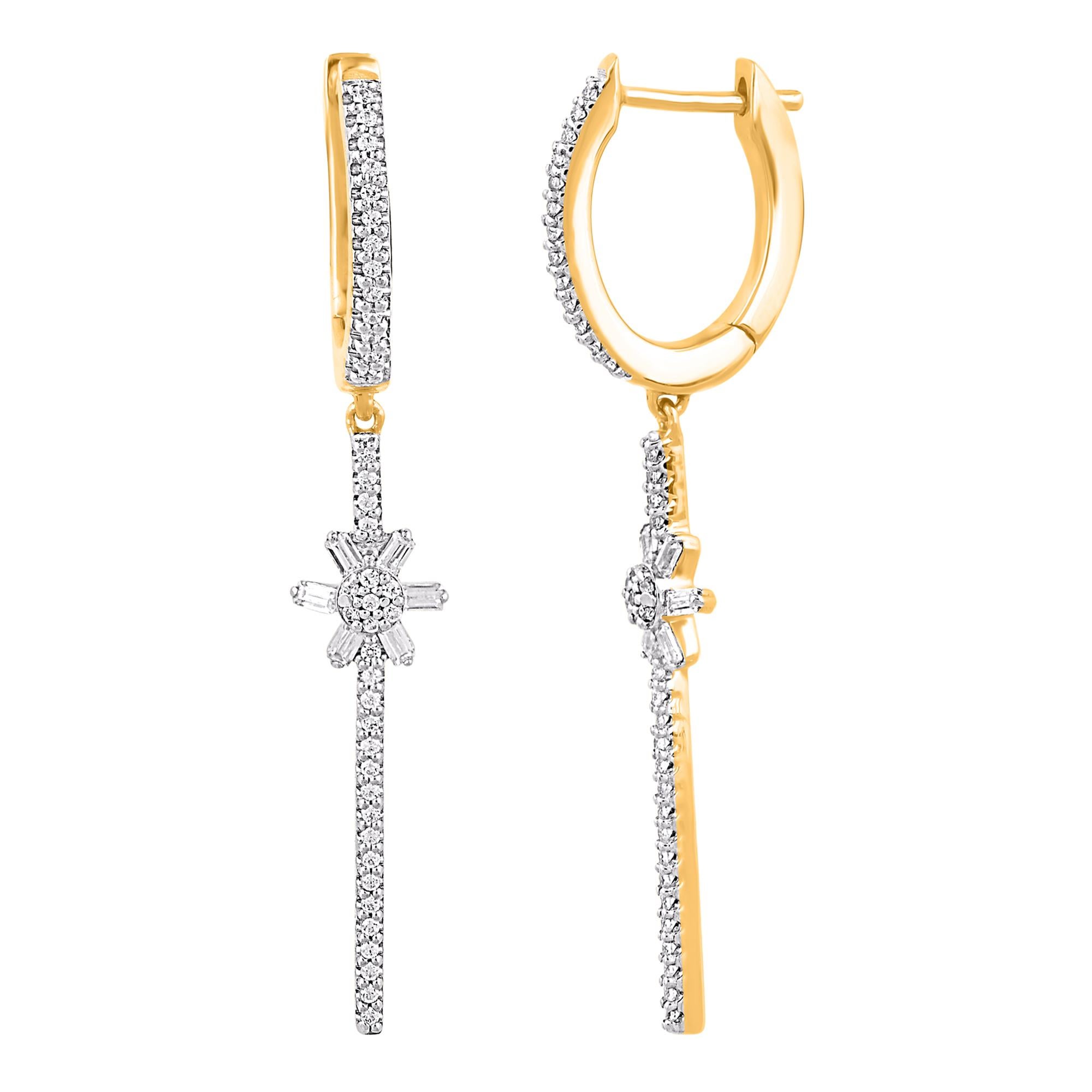 Graceful and modern, this diamond dangle earrings display your glamorous style. Crafted in 14 karat yellow gold with 96 round and baguette diamond in prong and channel setting. These earring secure with post back. The white diamonds are graded as