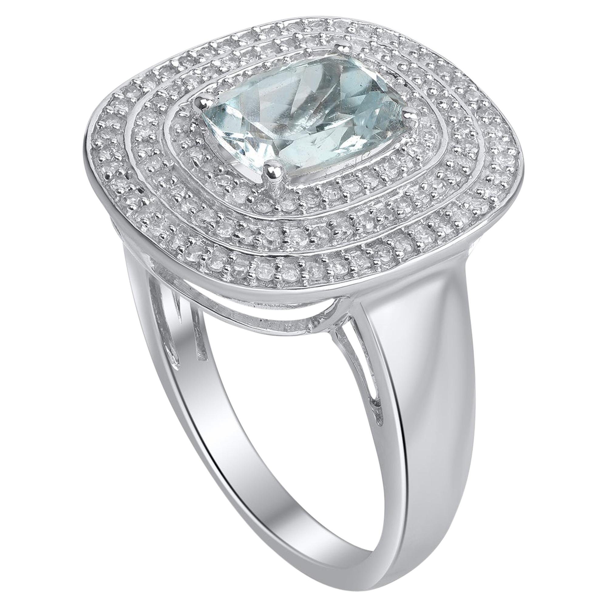 Dazzles with 118 brilliant diamonds and 1 natural aquamarine gemstone in pave setting and fashioned in 14-karat white gold. Diamonds are graded HI color, I2 clarity. 
