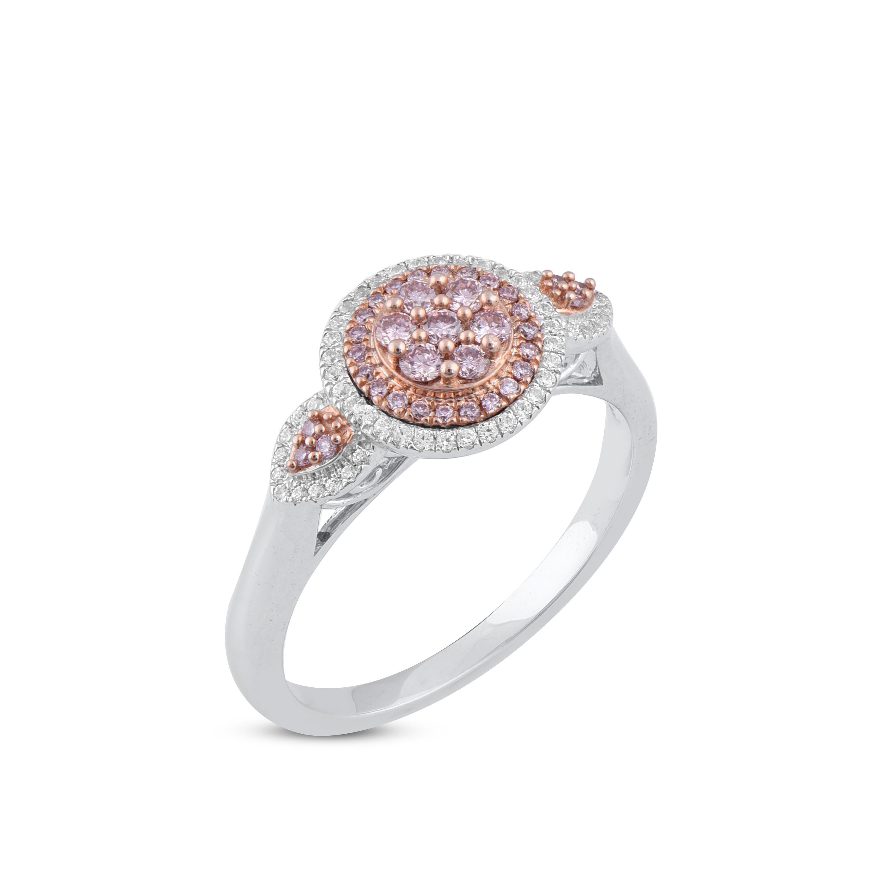Bold and classic, these diamond engagement ring are a jewelry box must-have. Crafted in cool 18 karat 2-tone gold and studded with 55 white and 35 pink diamond set in prong and pave setting and shines in H-I color I1 clarity. The band captivate with
