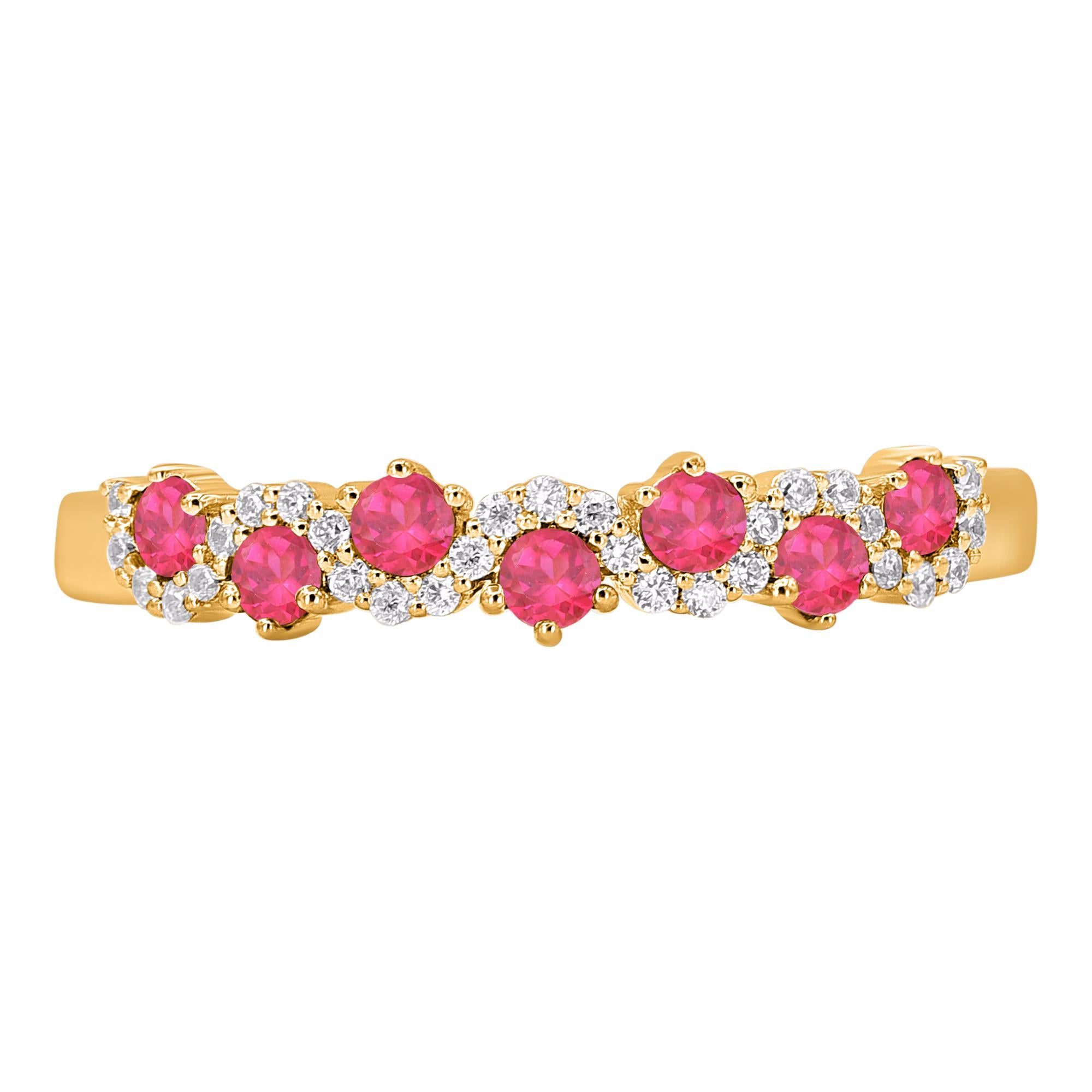 Cette magnifique bague de fiançailles en diamant et rubis a été fabriquée à la main en or blanc 14 carats. Les 29 diamants ronds et les 7 rubis sont élégamment montés en serti clos. Les diamants sont classés couleur H-I, pureté I2.  il s'agit d'un
