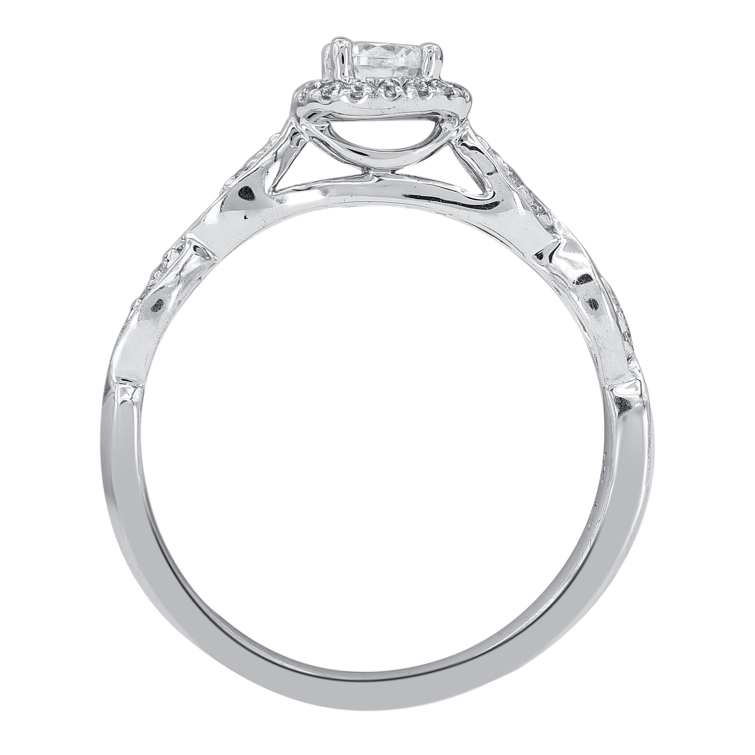 Classic and Contemporary, this diamond ring will enhance her jewelry collection. This beautiful ring features shimmering brilliant cut diamonds and single cut diamonds in prong and pave setting. crafted in 14 karat white gold. The ring is studded
