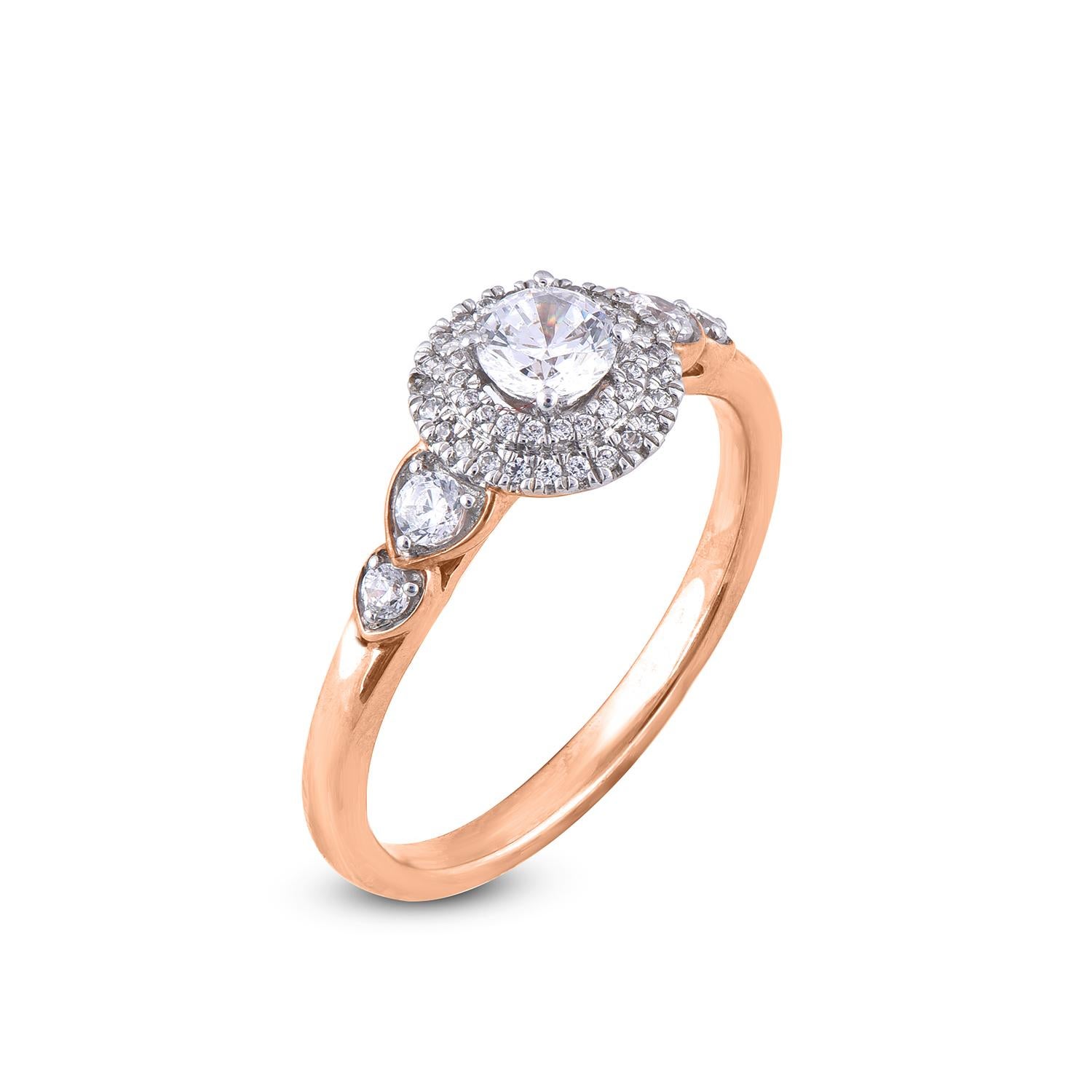 Cette bague de fiançailles à enchevêtrement de diamants ne manquera pas d'être admirée pour sa beauté et son élégance classiques inhérentes à son design. Elle comporte une pierre centrale ronde de 0,25 ct et des diamants alignés de 0,25 ct sur la