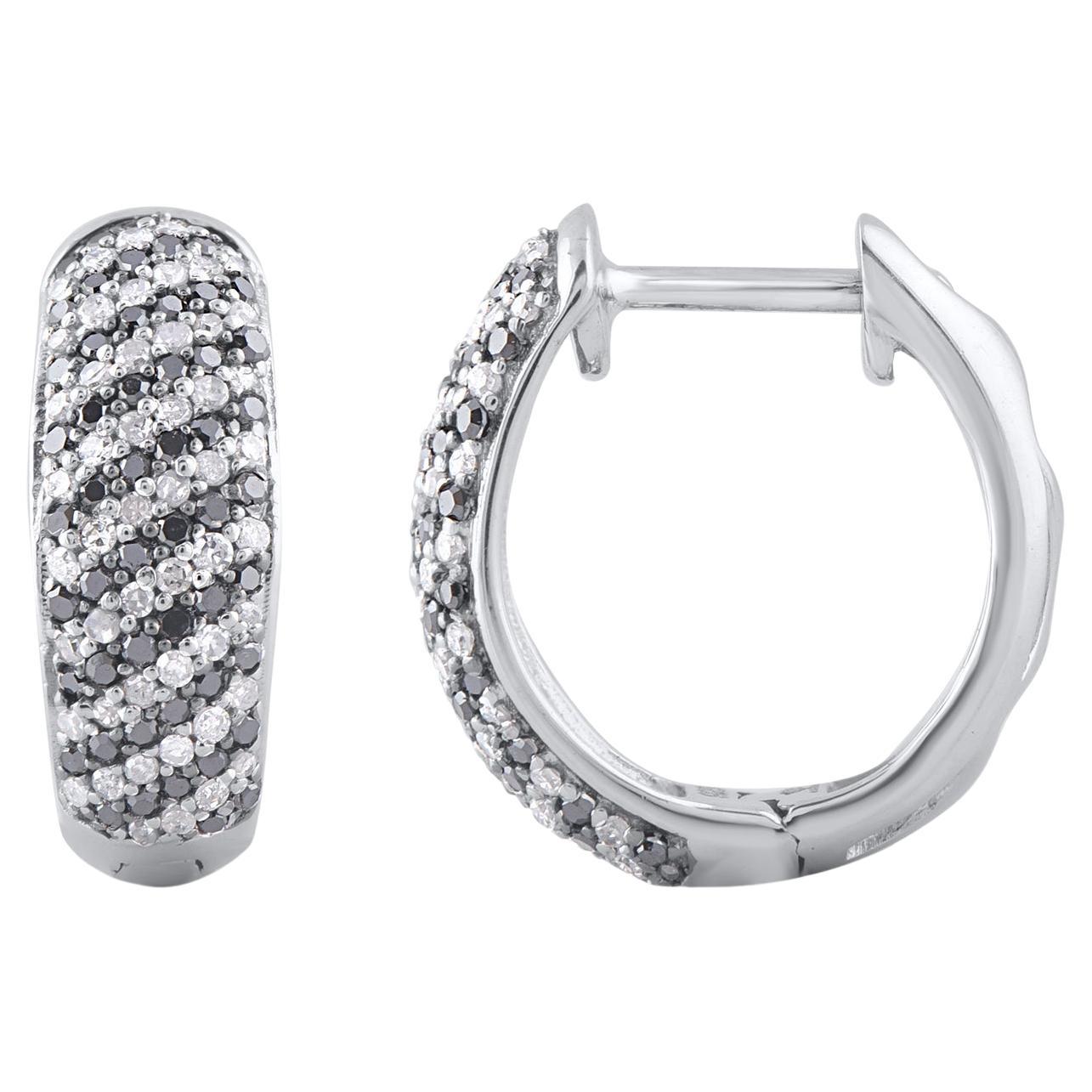 Bring charm to your look with this diamond hoop earrings. This earring is beautifully designed and studded with 200 single cut round diamond and black treated diamonds in pave setting. We only use natural, 100% conflict free diamonds which shines in