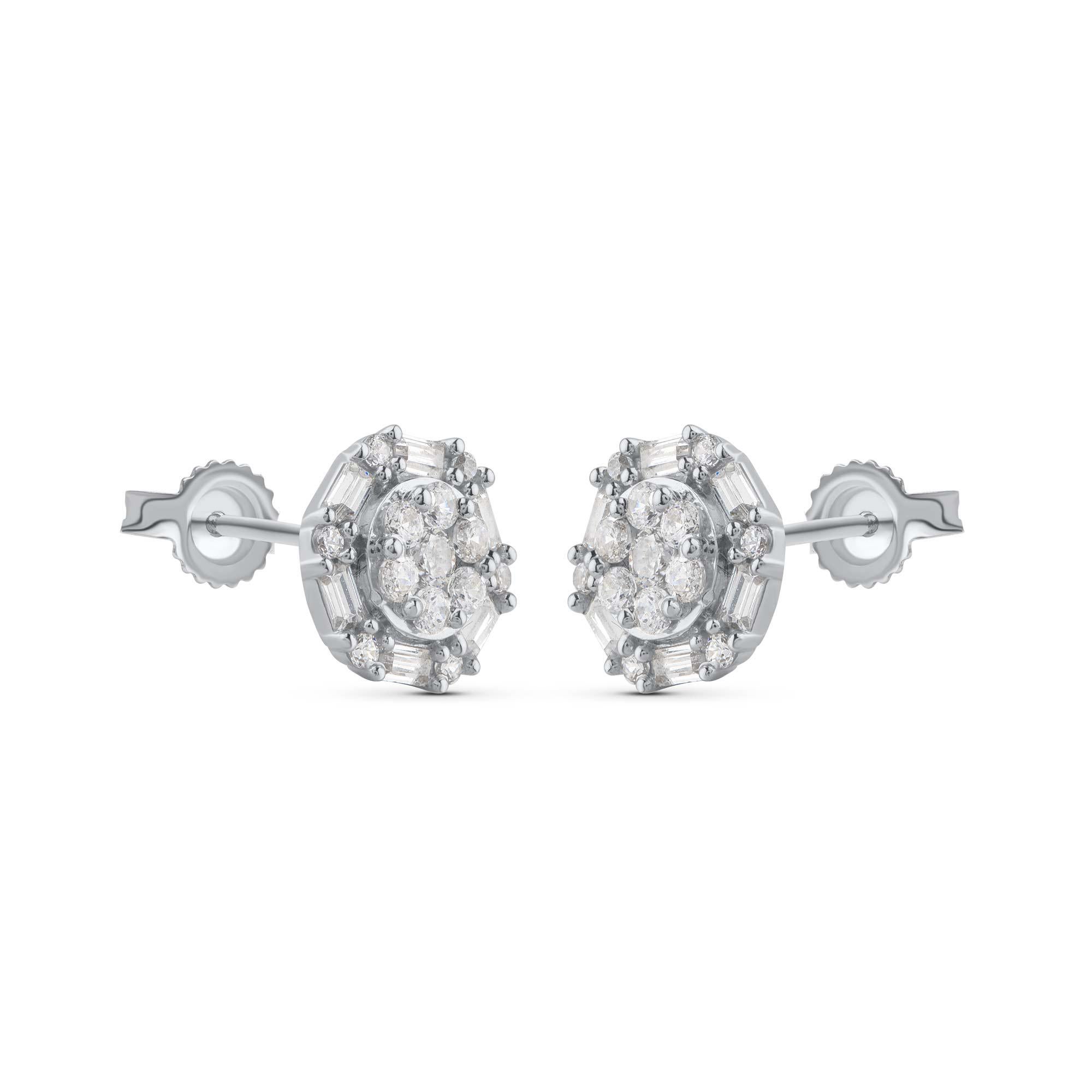 Look your elegant best in these everyday diamond studs. These diamond earrings are studded with 26 round and 12 baguette shape diamonds. The diamonds are graded HI Color, I2 Clarity. The earrings secure comfortably with post and back. 

This piece