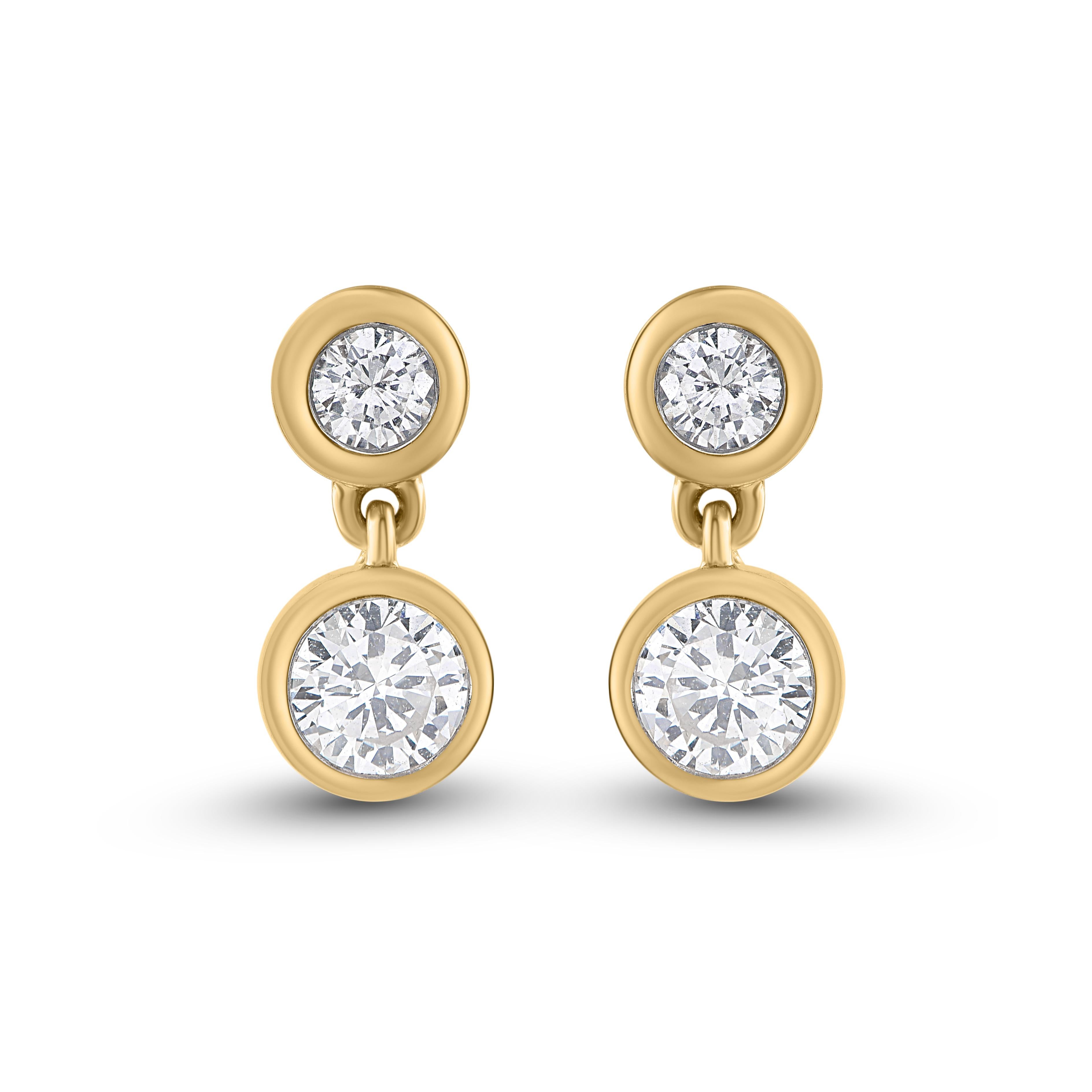 Add a sparkling touch with these dainty drop earrings. Diamond studded drop earrings in yellow gold, buffed to a brilliant lustre, these earrings secure easily with post back. Diamonds are graded H-I Color, SI3 Clarity. 
