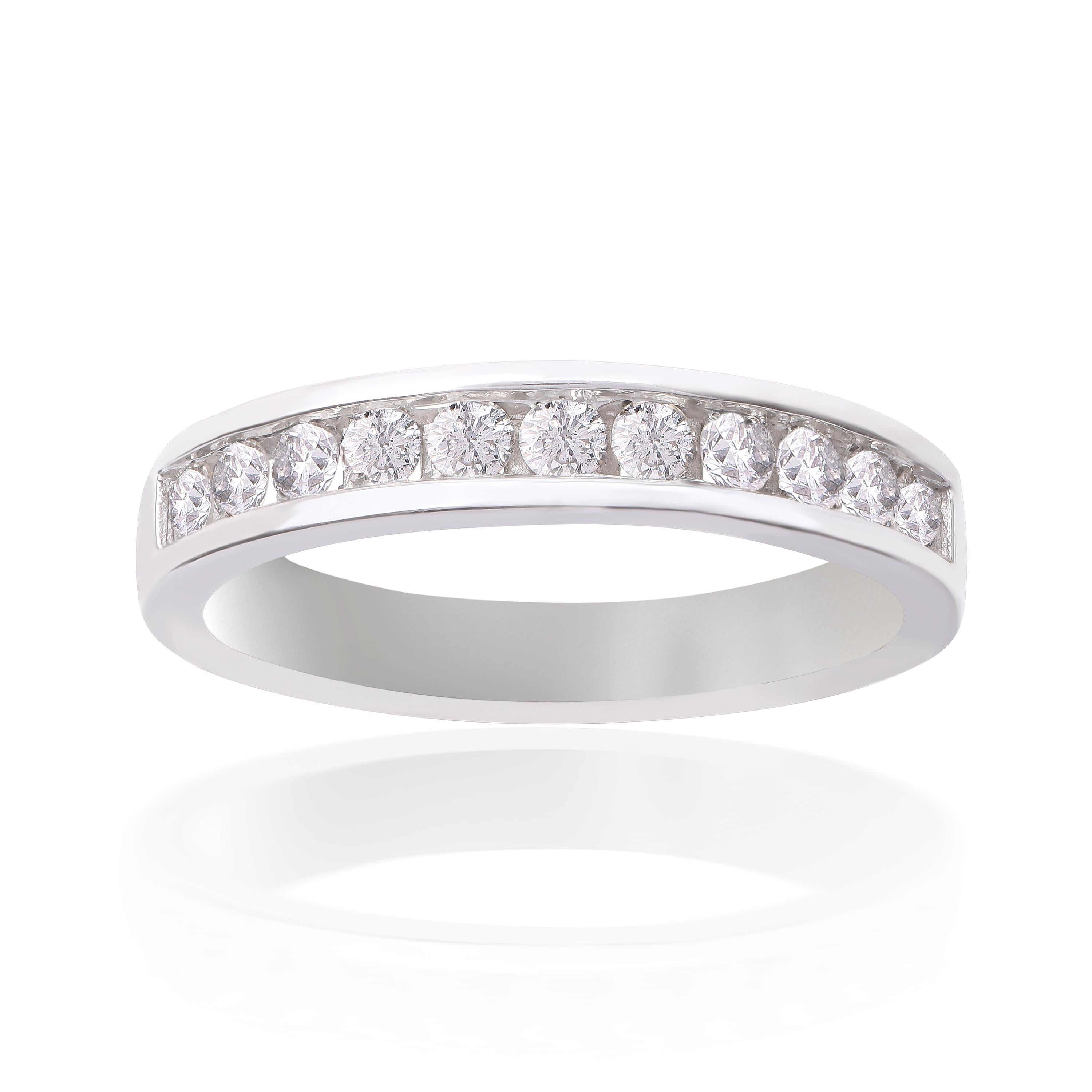 This classic diamond band is made in 18-karat white gold and studded with 11 brilliant cut diamonds beautifully in channel setting. Diamonds are graded H-I Color, I2 Clarity.