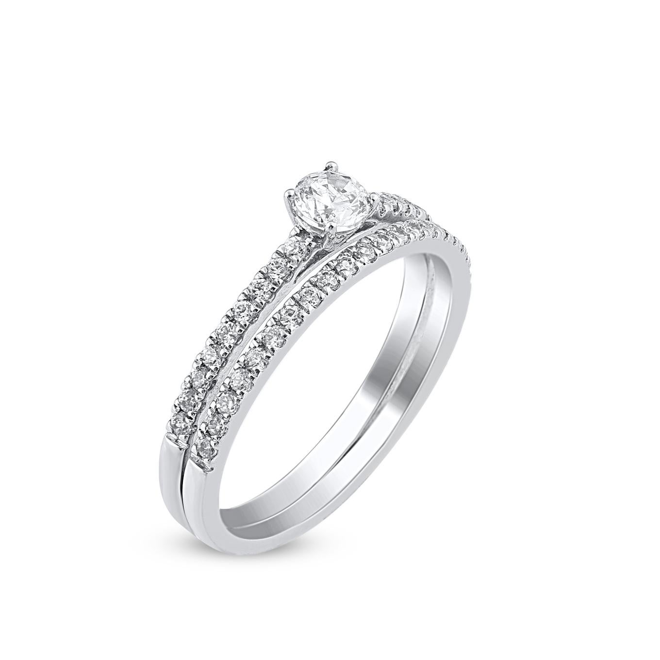 Symbolize your love with the classic design of this stunning round natural diamond bridal set in 14KT white gold. This wedding ring features a sparkling 39 brilliant cut round diamond beautifully set in prong setting. The total diamond weight is