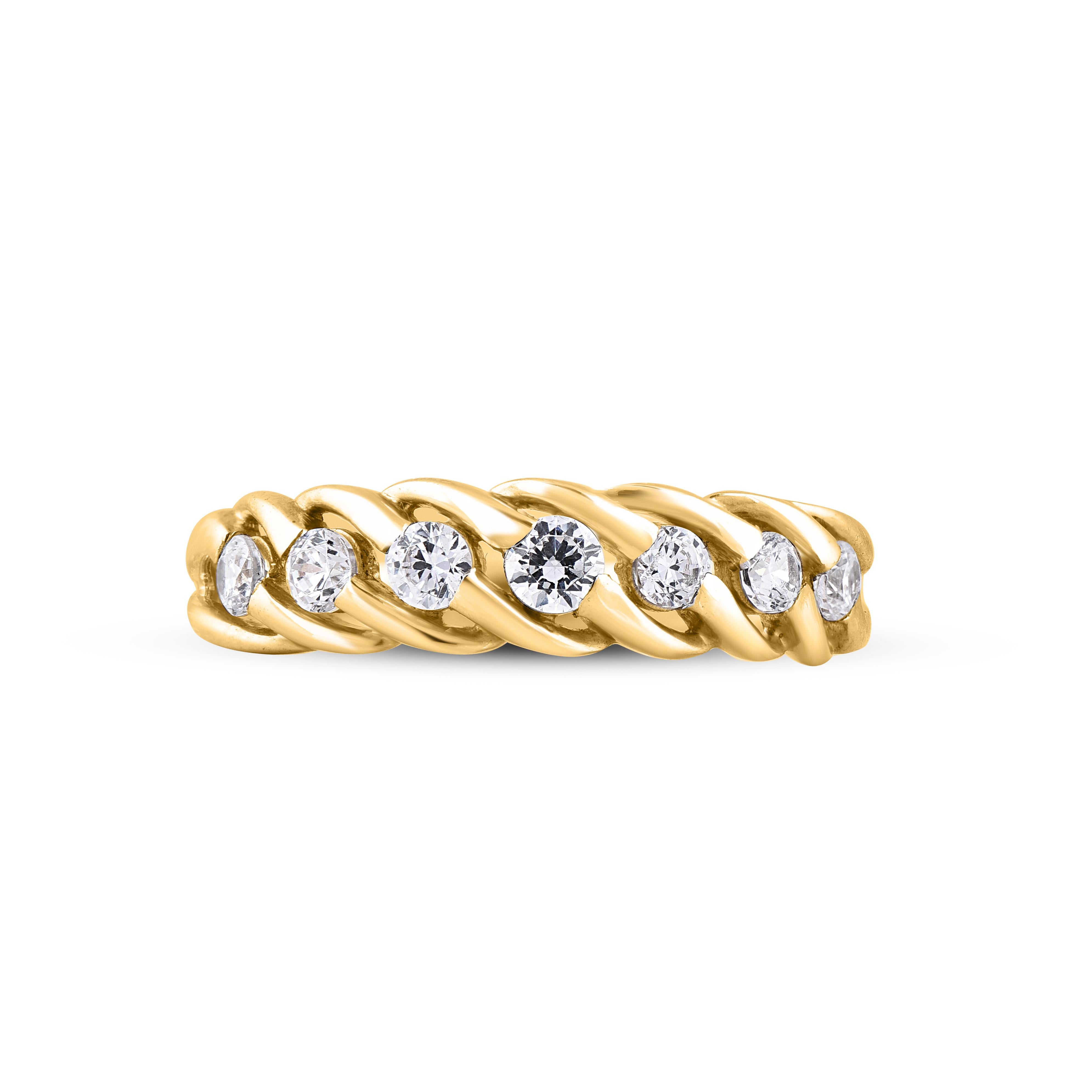 Give a touch of glamour to your fine jewelry collection with this diamond engagement band ring. This beautiful ring features shimmering brilliant cut diamonds in channel setting. Crafted in 14 karat yellow gold. The ring is studded with a total of 7