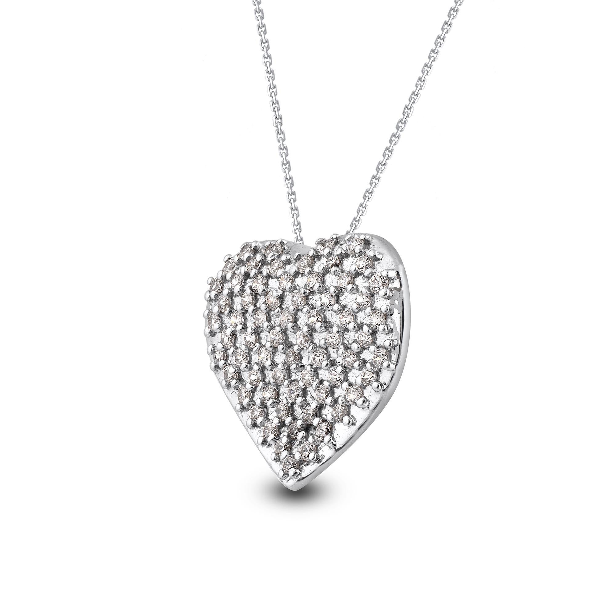 Bring charm to your look with this diamond heart pendant. The pendant is crafted from 14 karat white gold and features 64 round brilliant cut diamond set in bead setting and a high polish finish complete the brilliant sophistication of this