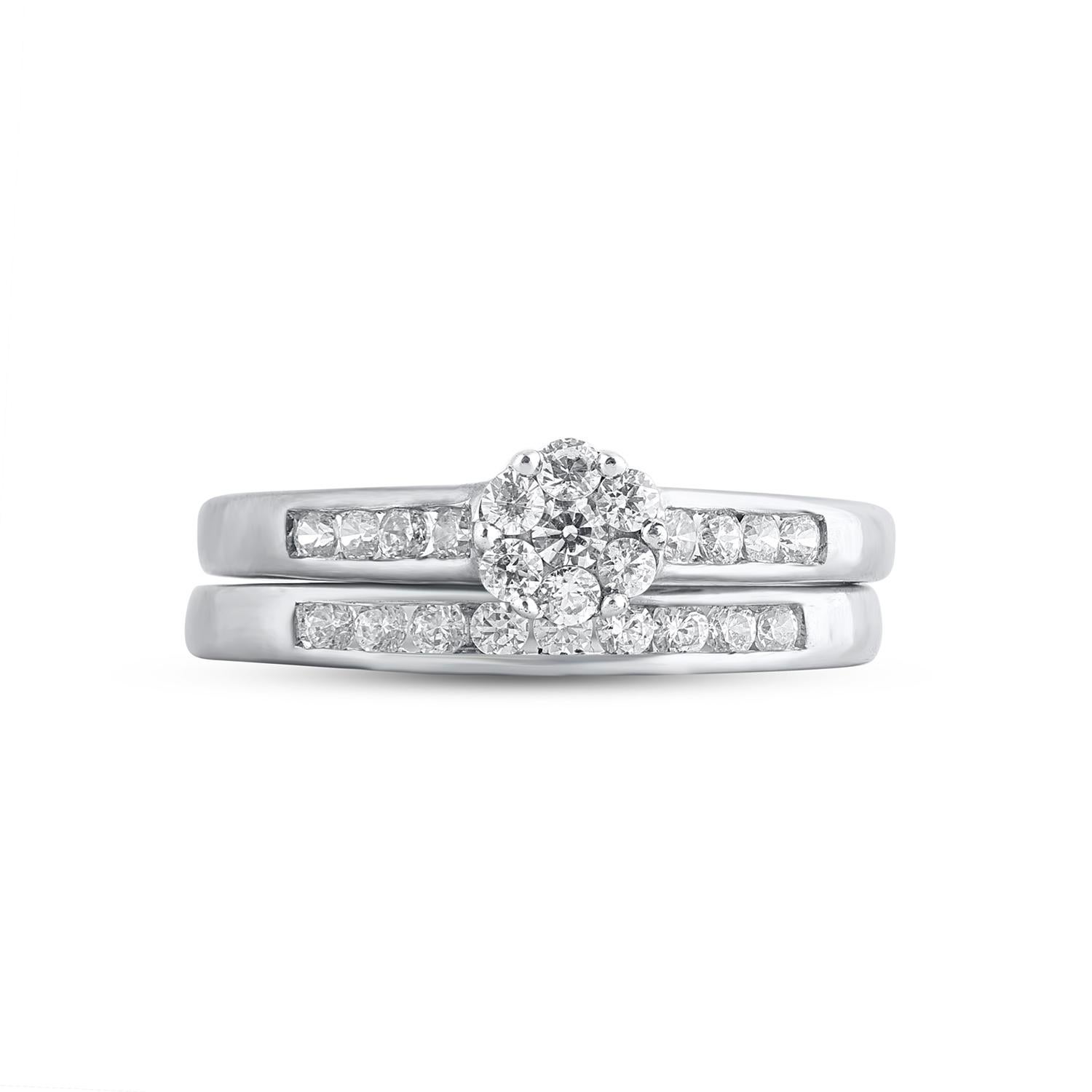 Express your love with this classic and dazzling diamond bridal set. Crafted in 14 Karat white gold. This wedding ring features a sparkling 24 brilliant cut diamonds beautifully set in pressure & channel setting. The total diamond weight is 0.50