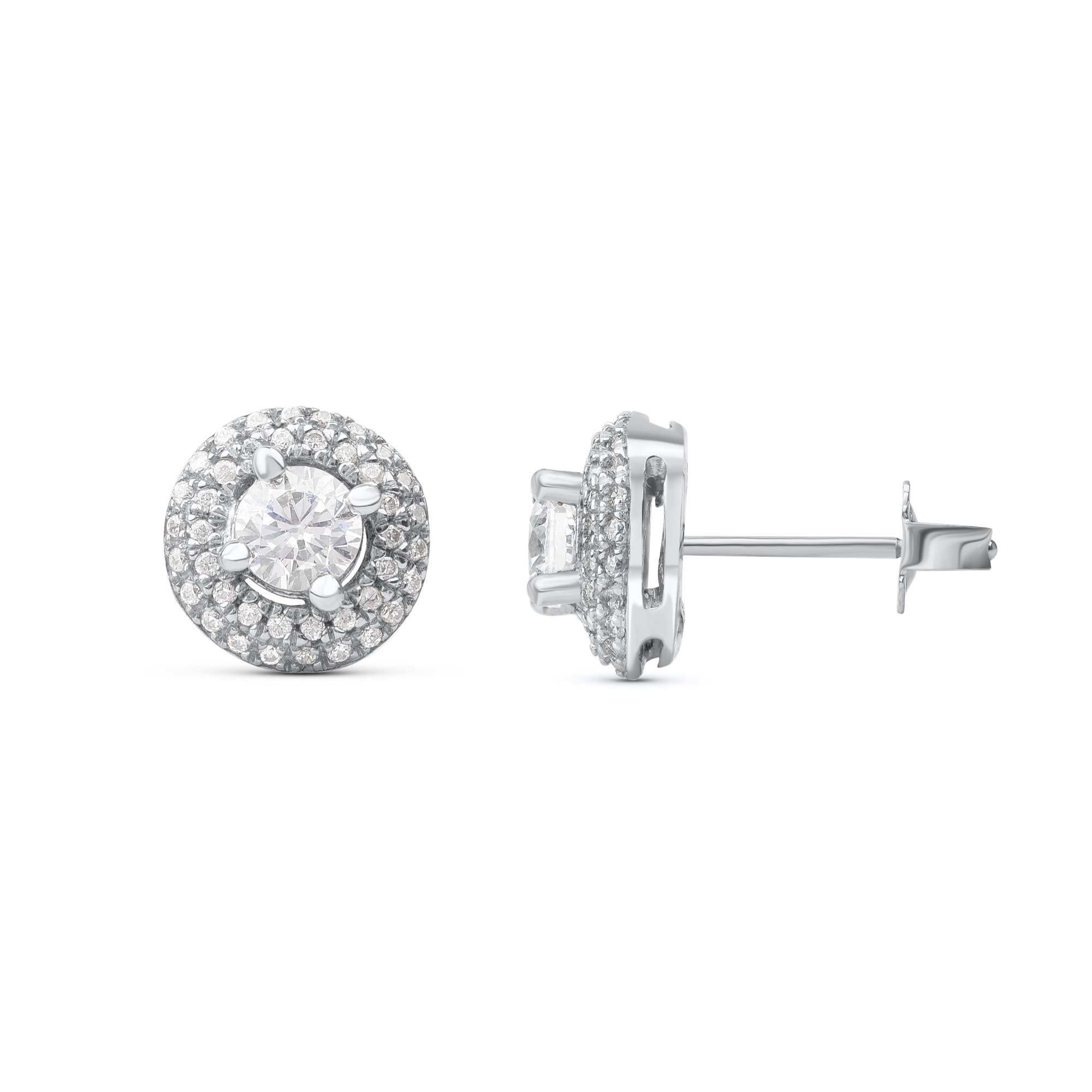 Embedded with 82 brilliant cut diamonds elegantly set in prong and micro-prong setting - crafted by our in-house experts in 18 kt white gold. Diamonds are graded H-I Color, I1 Clarity. Dazzling and dainty, these diamond accented stud earrings are a
