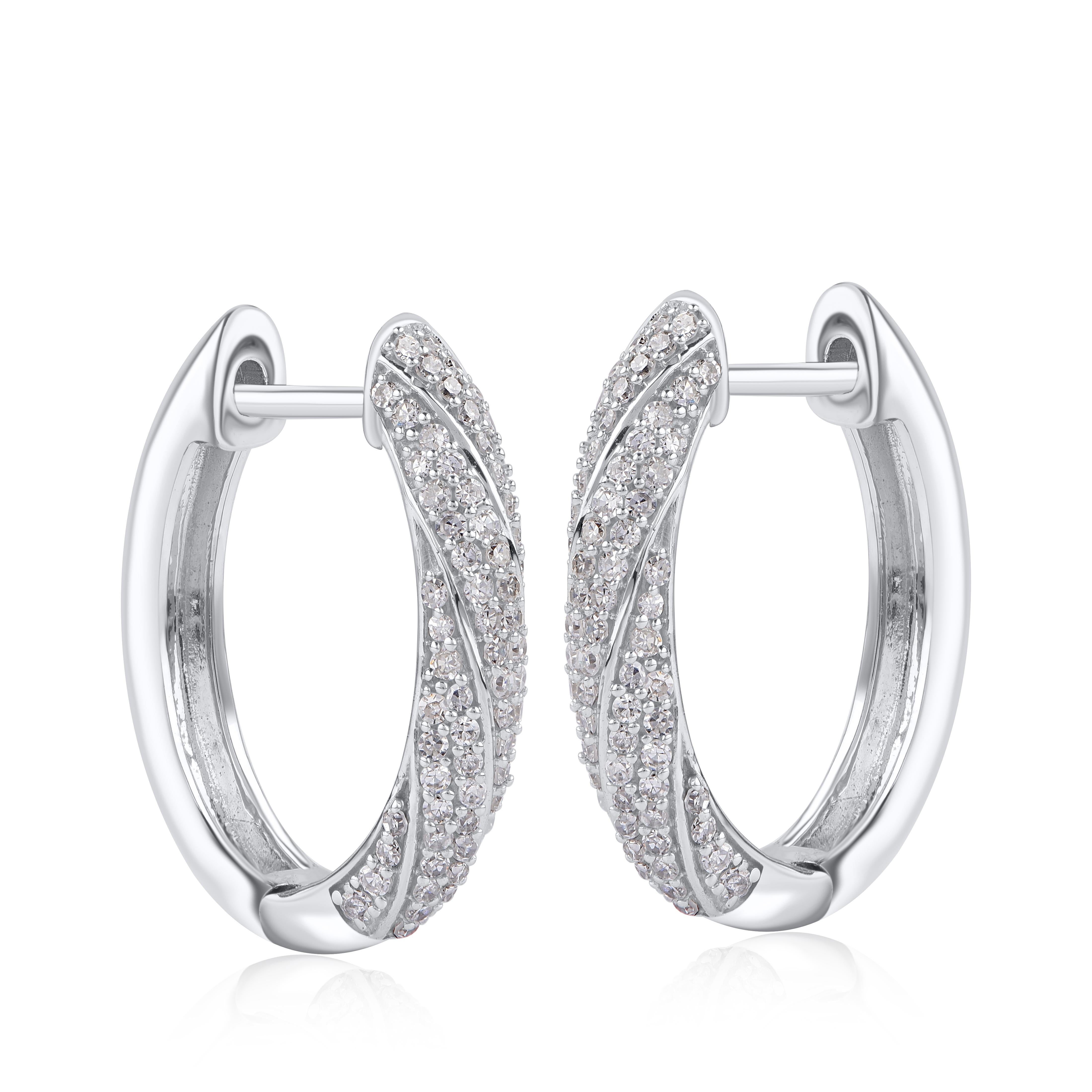 Bring charm to your look with this spiral design diamond hoop earrings. The earrings is crafted from 18-karat White gold and features Round- 160 Natural white diamond set in pave setting and shines in H-I color I2 clarity. A high polish finish