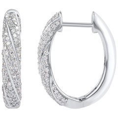 TJD Boucles d
oreilles en or blanc 18 carats avec diamant 0.50 carat et design en spirale.