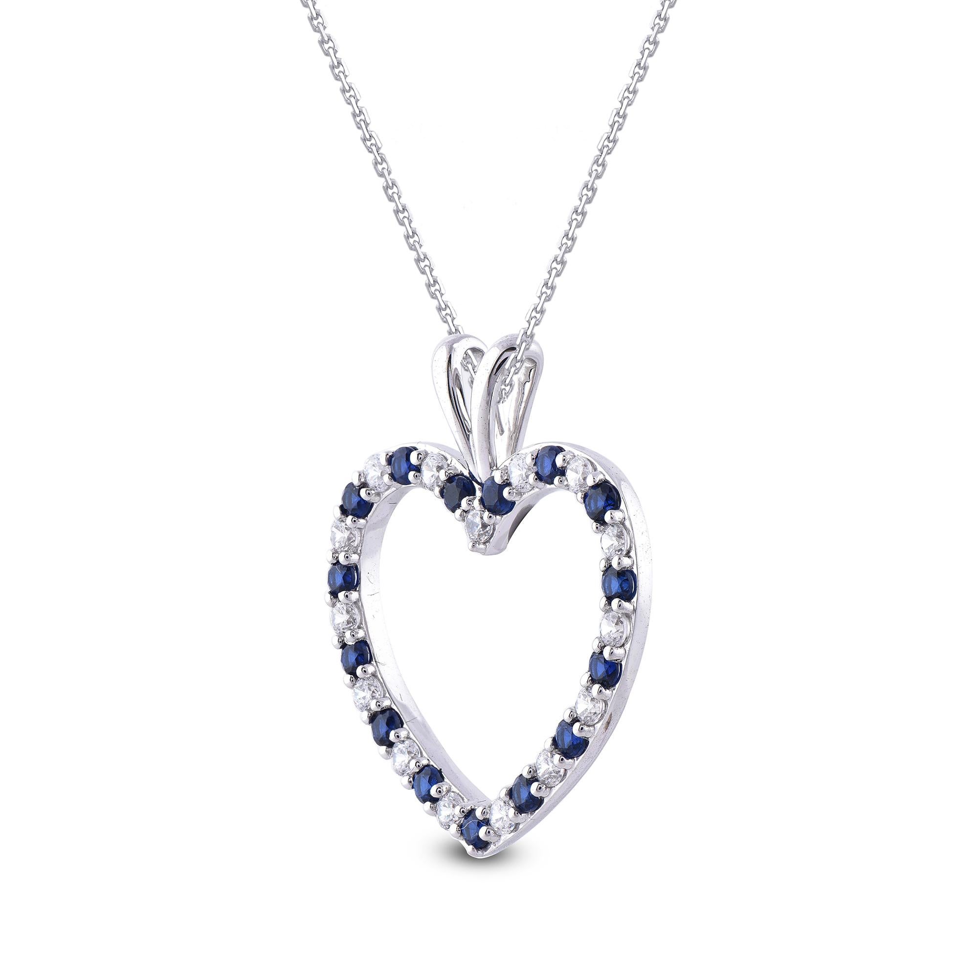 Why blend in when you can stand out with this beautiful diamond and blue sapphire studded heart pendant. The pendant is crafted from 14 karat white gold yellow, and features 15 white diamonds and 15 blue sapphire set in prong setting, H-I color I2