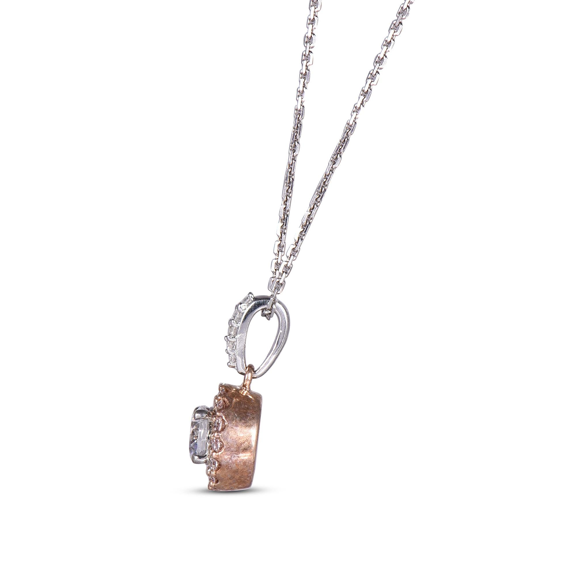 Dai un tocco di fascino al tuo look con questo ciondolo con diamante. L'anello è realizzato in 18 carati bicolore e presenta 6 diamanti tondi taglio brillante bianchi e 15 diamanti rosa incastonati, di colore G-H e purezza SI1-2 e una finitura