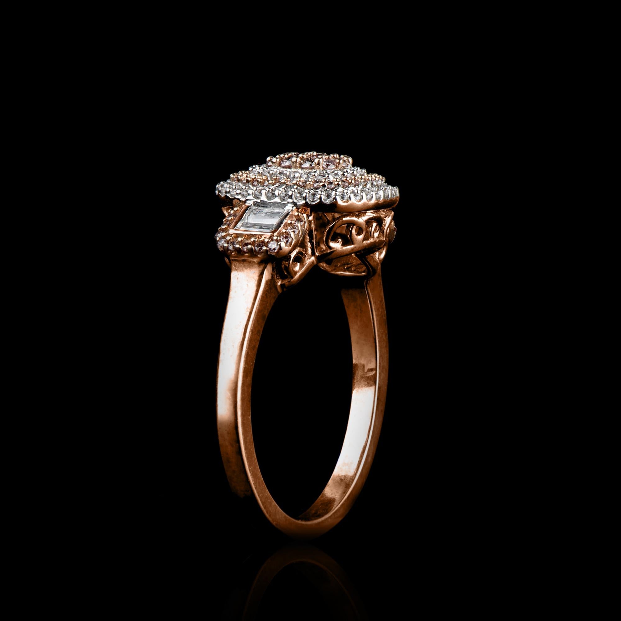 This Round Diamond Engagement Band Ring in 14K rose gold showcases 0.50 carats of sparkling 58 round, 4 baguette and 66 natural pink rosé diamonds set in prong and channel setting. The diamonds are natural, not-treated and conflict-free with H-I