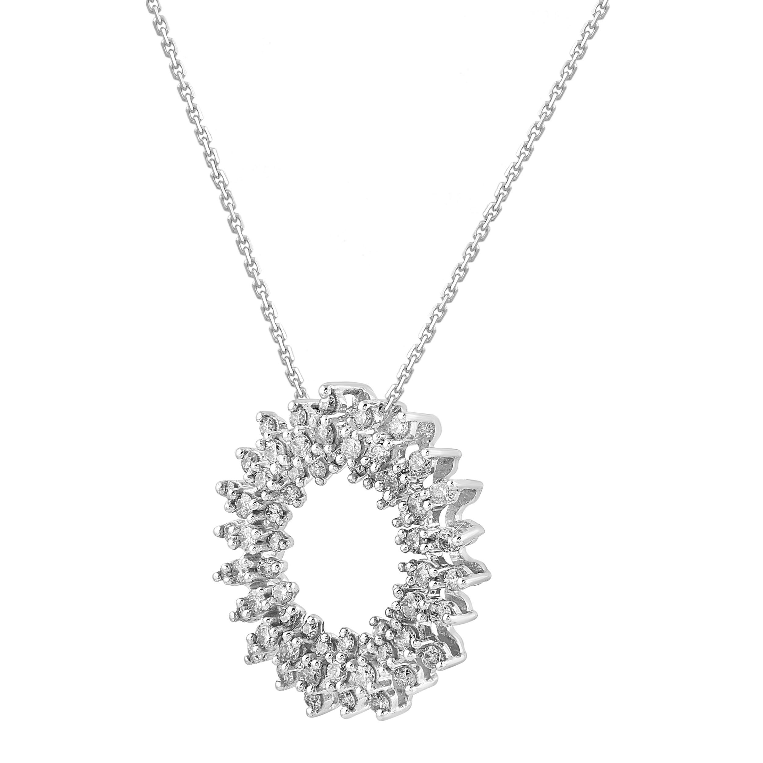 Stunning and Classic, this open circle diamond pendant proclaims her sophistication. The pendant is crafted from 14-karat white gold and studded with 66 round brilliant cut & single cut white diamonds in prong setting. H-I color I-2 clarity and a