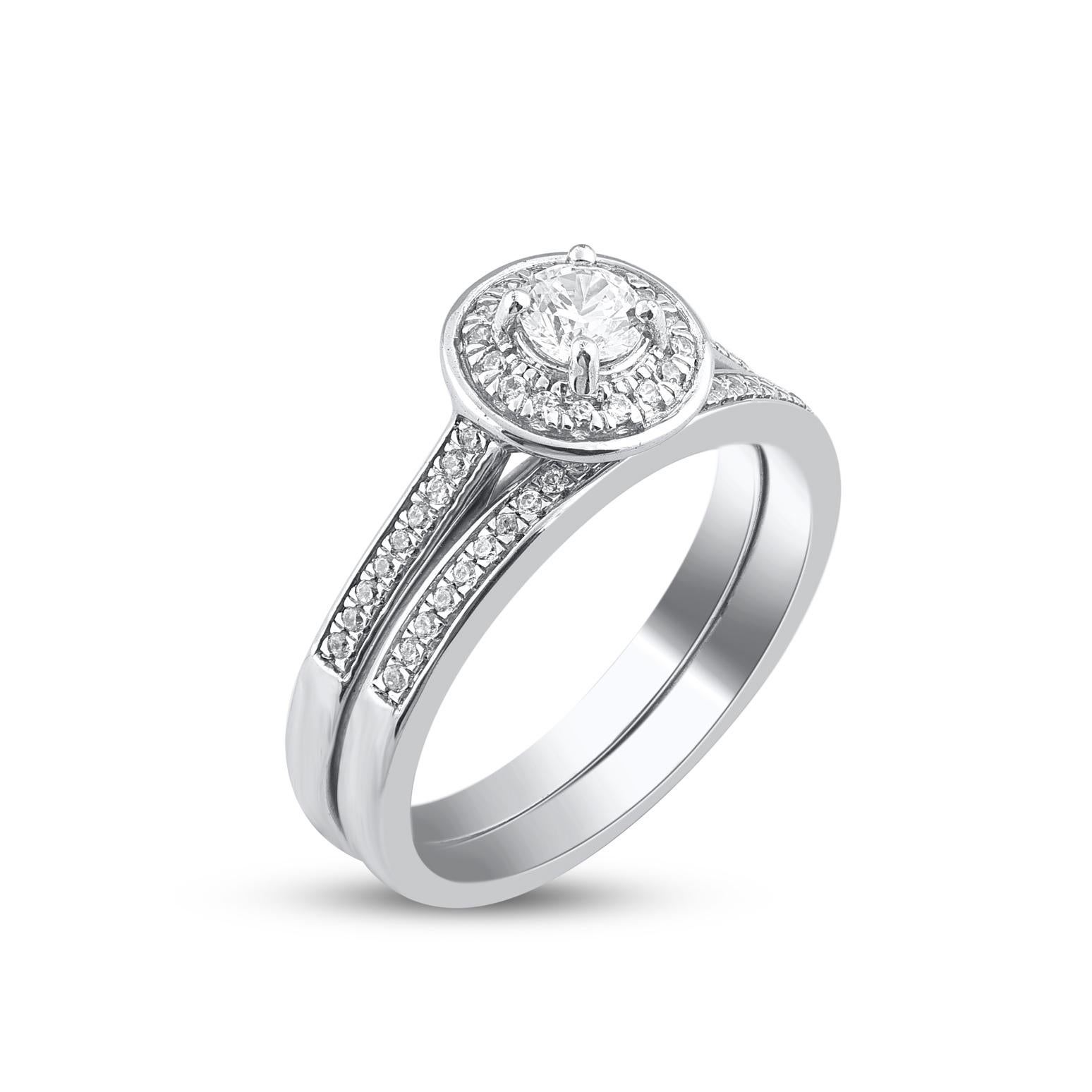 On that special day, express all your love with this classic and dazzling diamond bridal set. Crafted in 14 Karat white gold. This wedding ring features a sparkling 58 brilliant cut and single cut round diamonds beautifully set in prong & pave