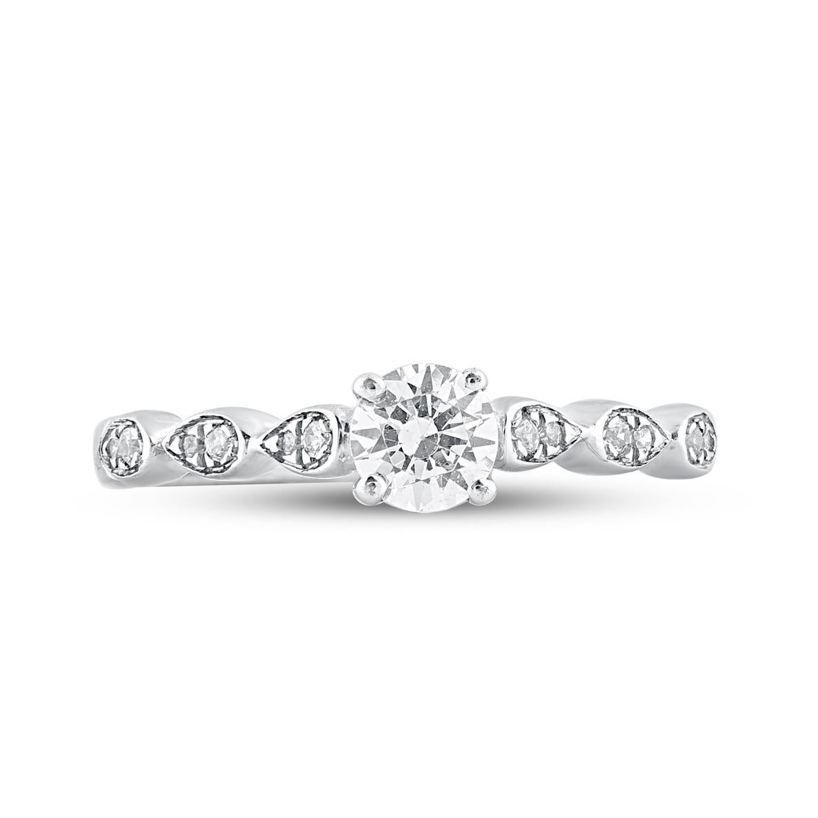 Give a touch of glamour to your fine jewelry collection with this diamond engagement ring. Expertly crafted in 14 Karat white gold and shines with 13 single cut and brilliant cut diamond in prong and pave setting. The total weight of diamonds 0.50