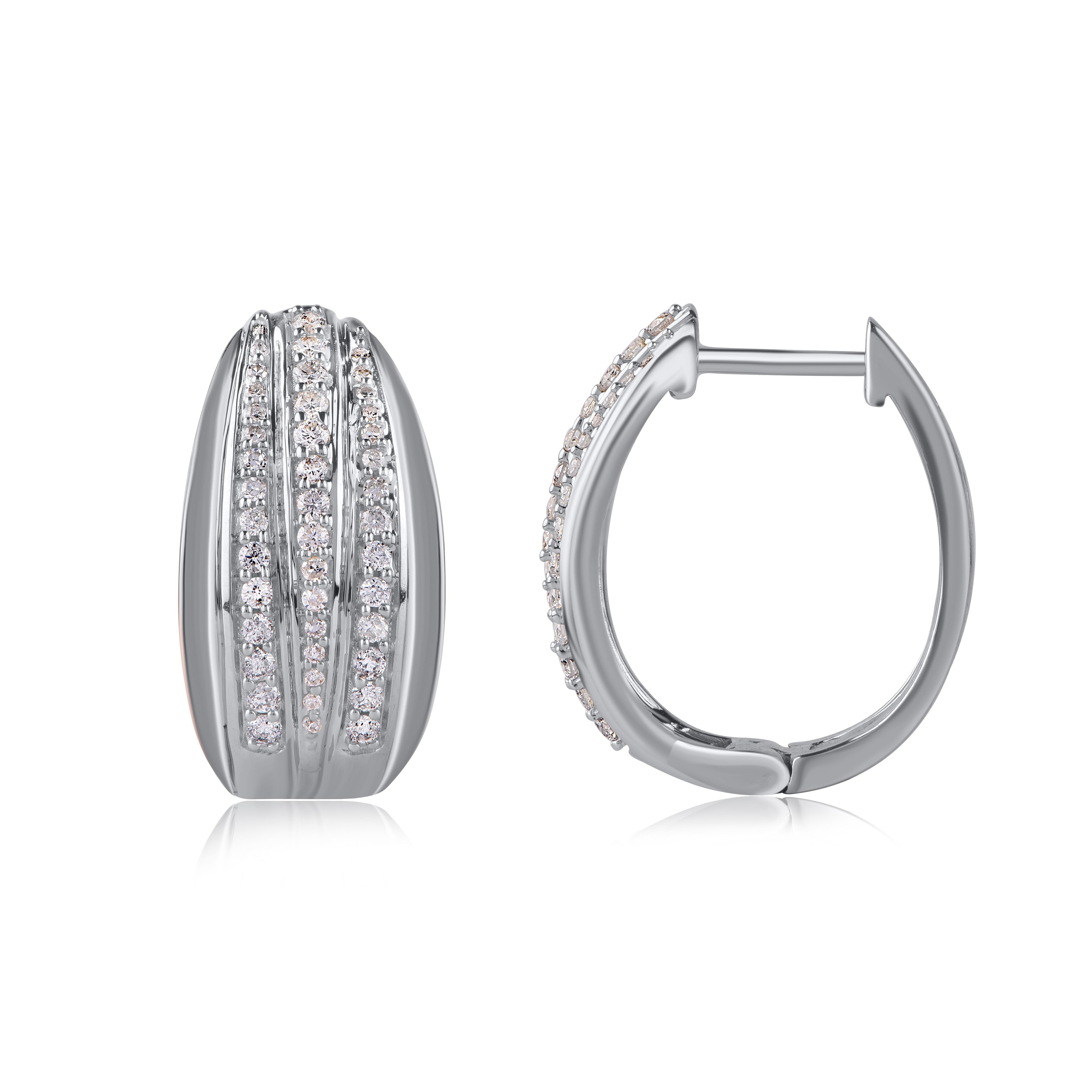 A sparkling delight, these diamond hoop earrings fit her charming aesthetic. Embellished with 86 round single cut and brilliant cut diamond set in pave setting, and dazzles with H-I color I2 clarity. Captivating with 0.50 Carat and crafted by our