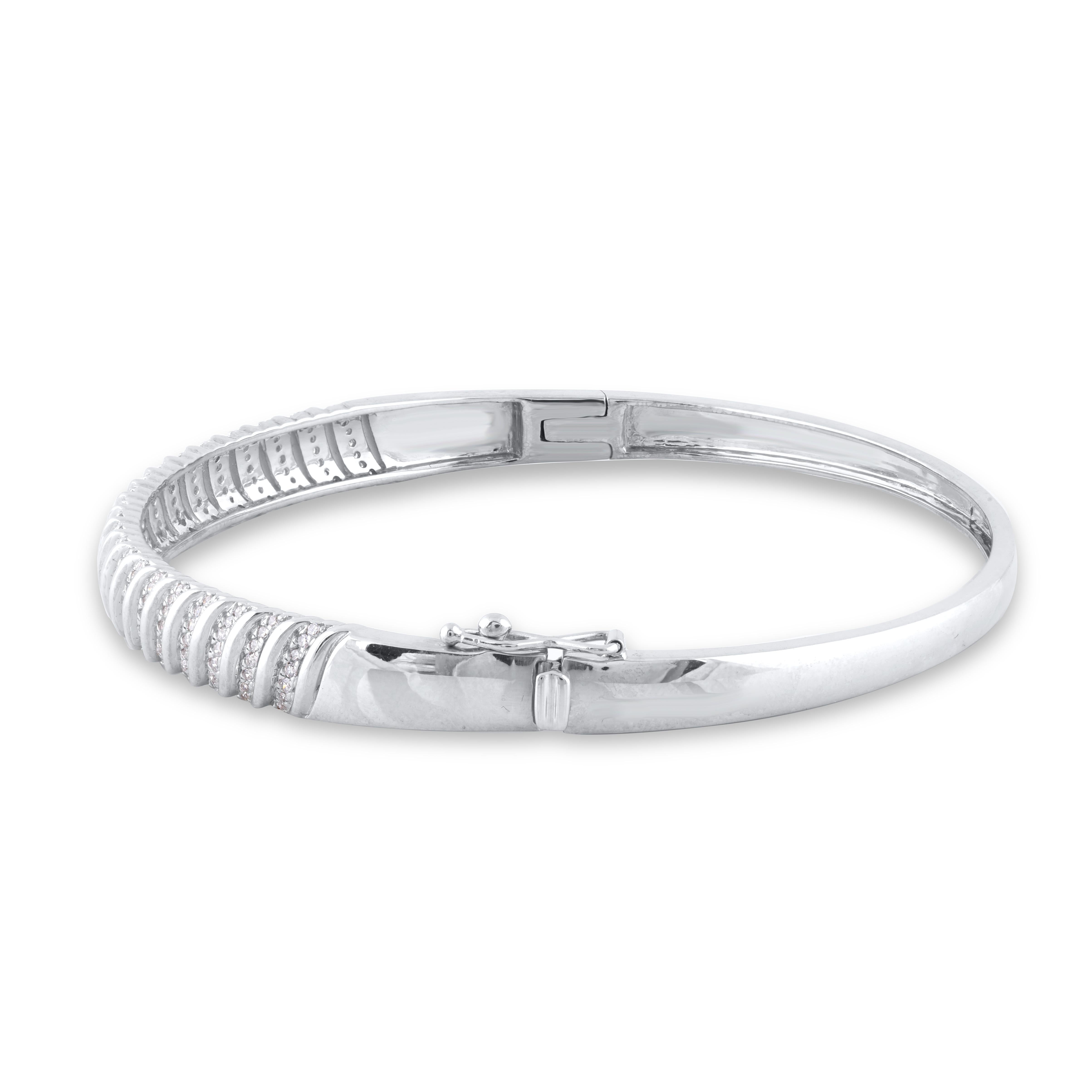 Express your sophisticated style with this gorgeous diamond bangle bracelet. This bangle bracelet features 147 natural single cut diamonds in prong setting and crafted in 14 karat white gold. The total diamond weight is 0.50 carat. Diamonds are