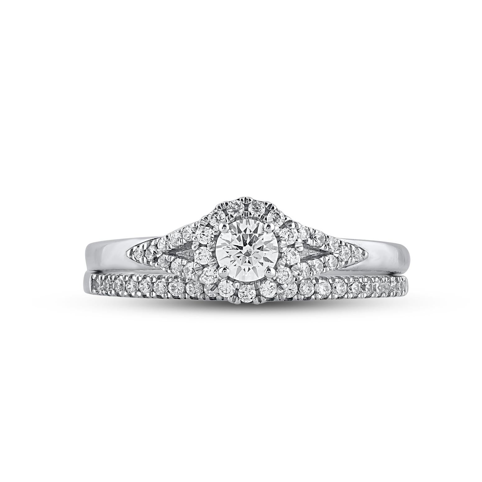 On that special day, express all your love with this elegant and dazzling diamond bridal set. Crafted in 14 Karat white gold. This wedding ring features a sparkling 53 brilliant cut and single cut round diamond beautifully set in prong setting. The