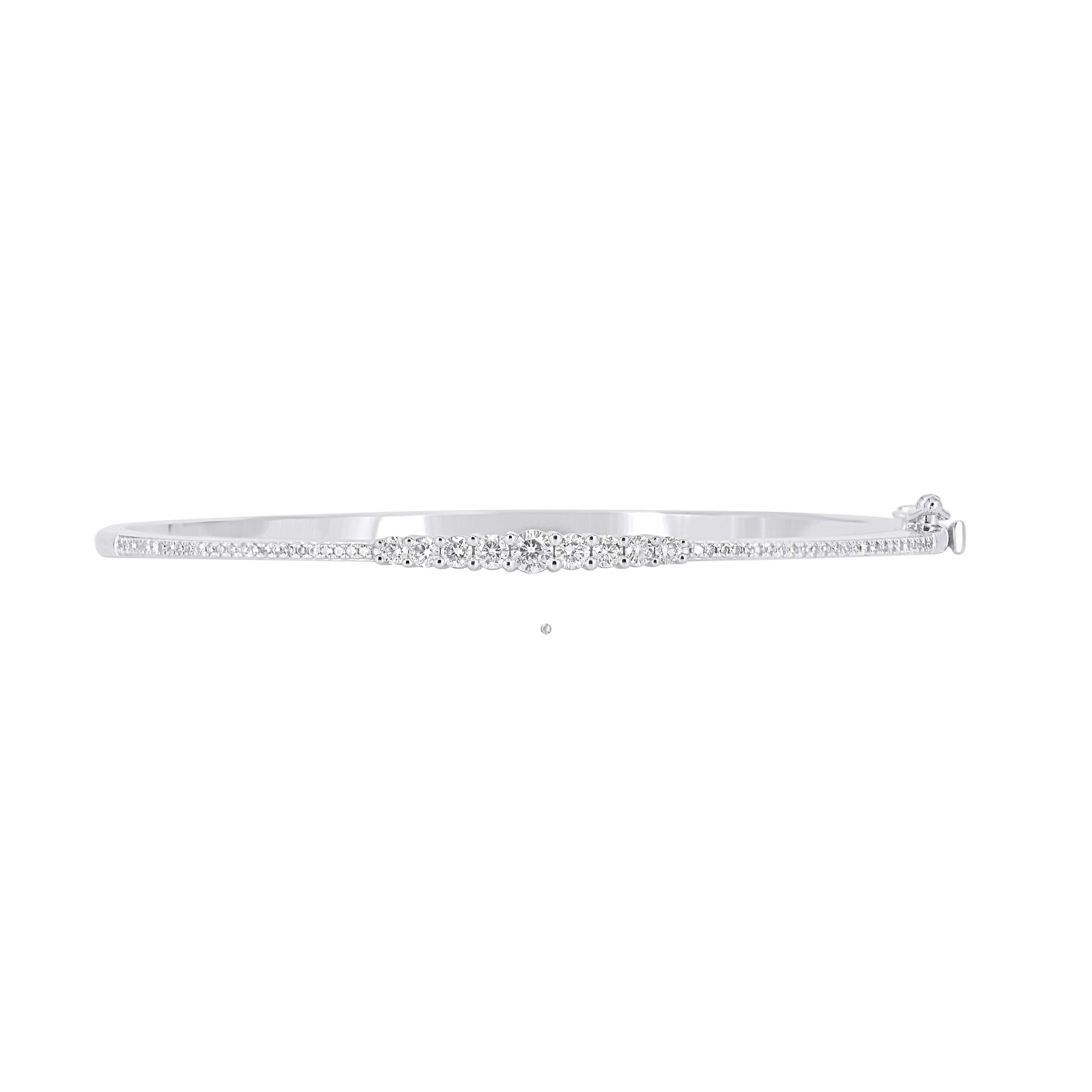 Classic and sophisticated, this diamond bangle bracelet pairs well with any attire.
This Shimmering bangle bracelet features 61 natural round single cut & Brilliant cut diamonds in prong setting and crafted in 14kt white gold. Diamonds are graded