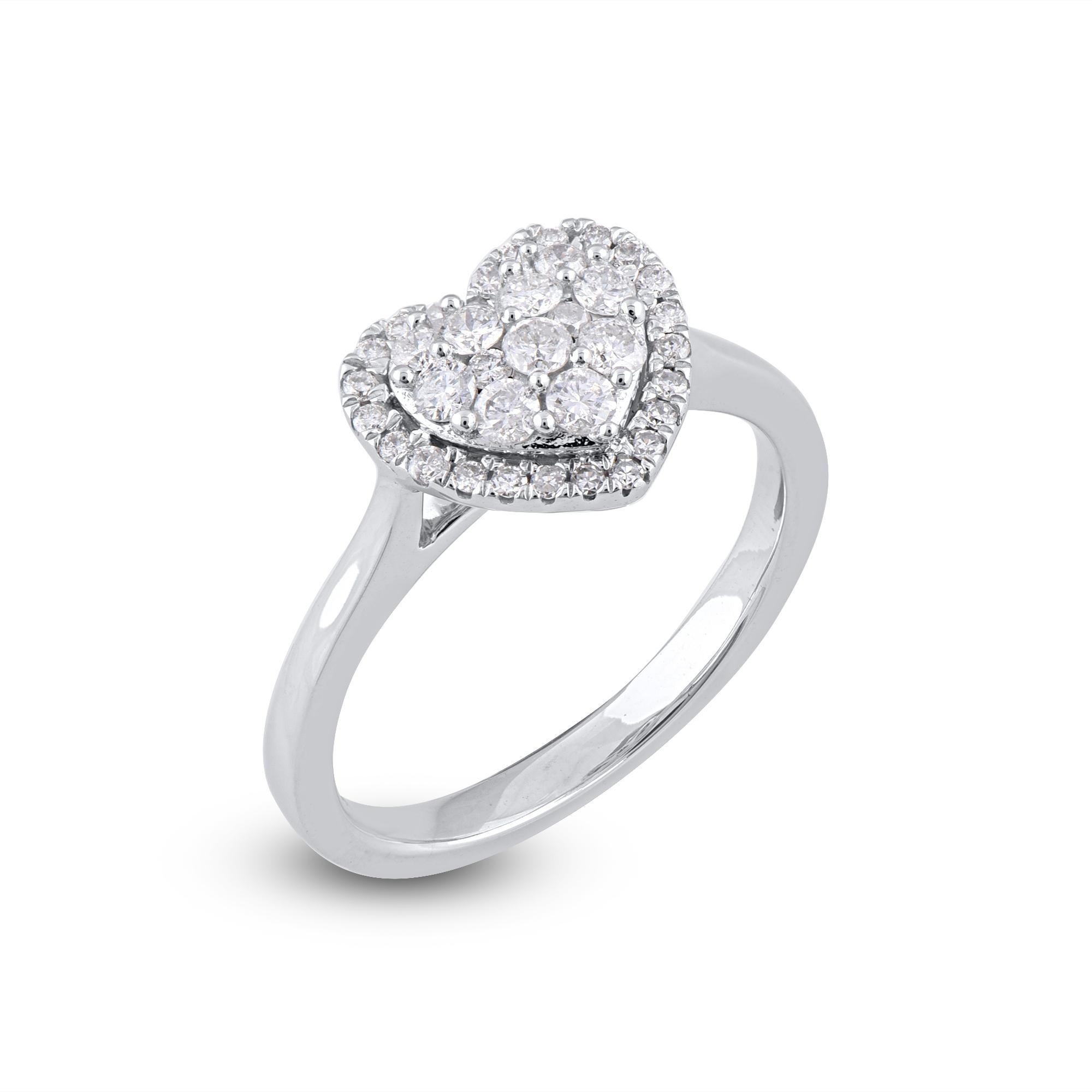 Win her heart with this classic and elegant diamond heart ring. These diamond ring are studded with 36 single cut and brilliant cut round diamonds in prong and pressure setting and crafted in 14kt white gold. The white diamonds are graded as H-I