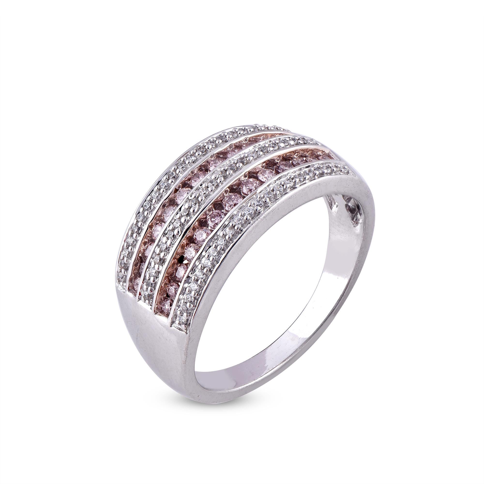 Make lifelong memory with this multi row diamond wedding band ring. The ring is crafted from 18 karat gold in your choice of white, rose, or yellow, and features 63 white and 26 pink diamonds, Prong set, H-I color I1 clarity and a high polish finish