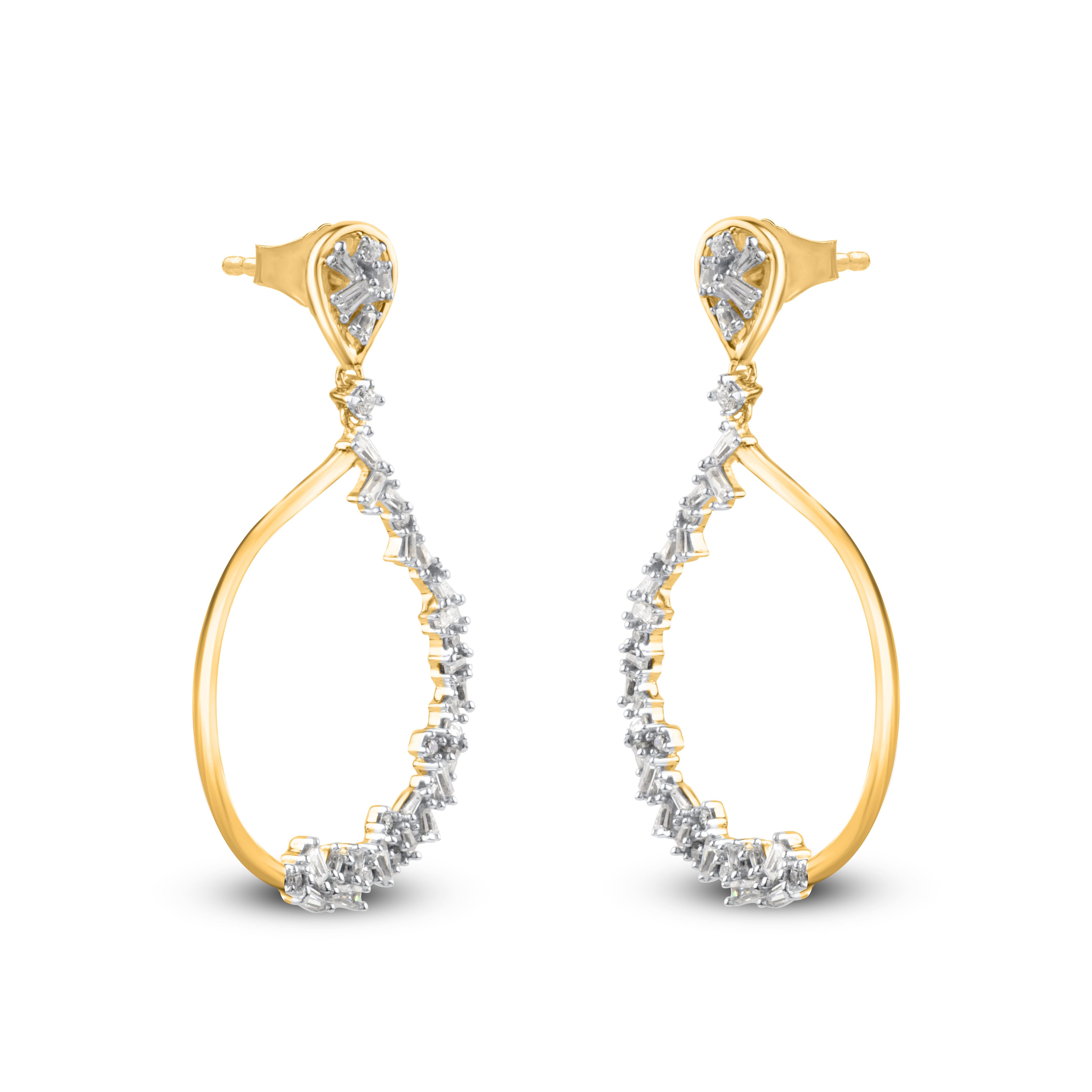 A sparkling delight, these diamond drop earrings fit her charming aesthetic. Embellished with 18 round brilliant and 54 baguette-cut diamond set in prong setting, and dazzles with H-I color I2 clarity. Captivating with 0.50 Carat and secures