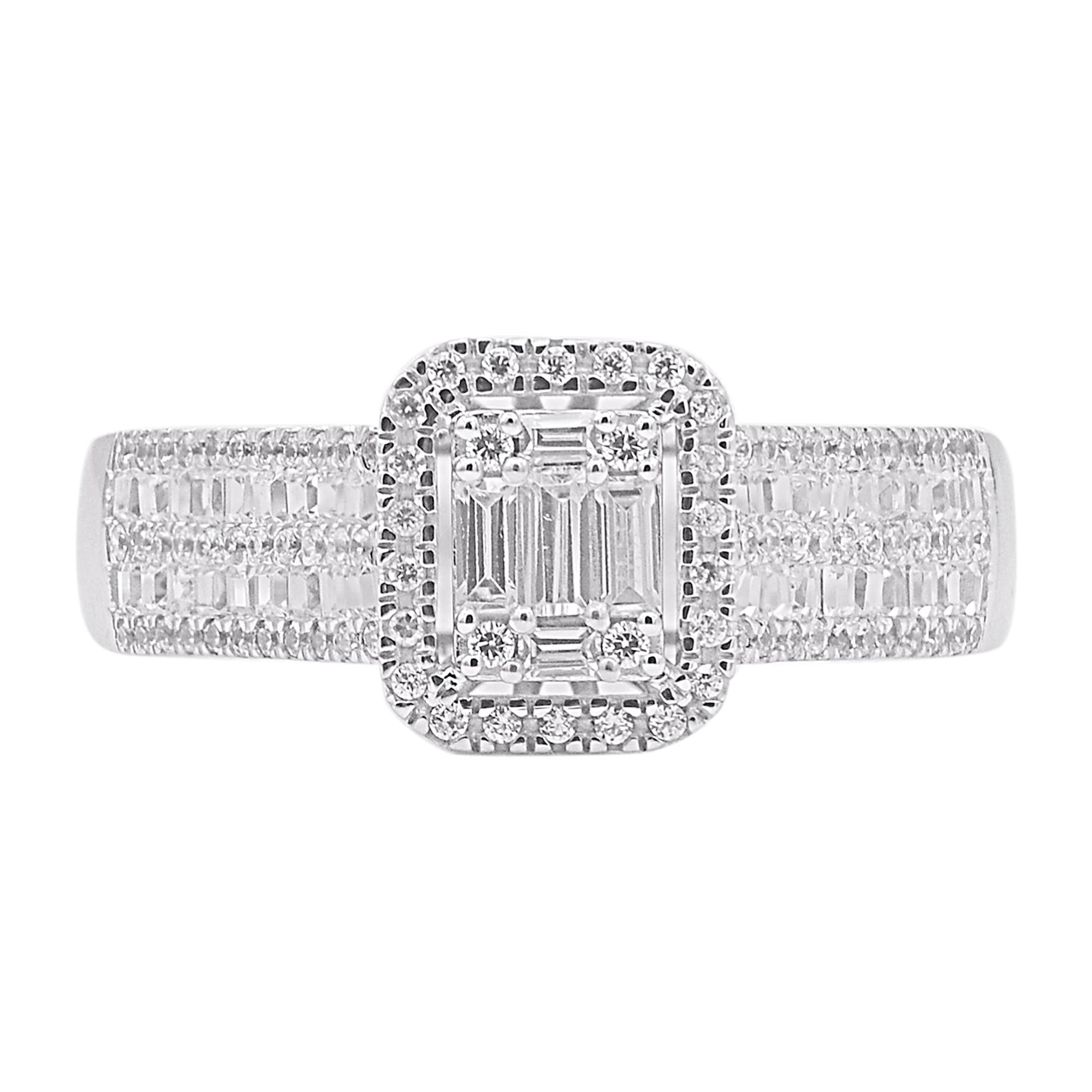 Express your love for her in the most classic way with this solitaire engagement ring. Beautifully crafted by our inhouse experts in 14 karat white gold and embellished with 145 baguette cut and single cut diamond set in prong setting. Total diamond