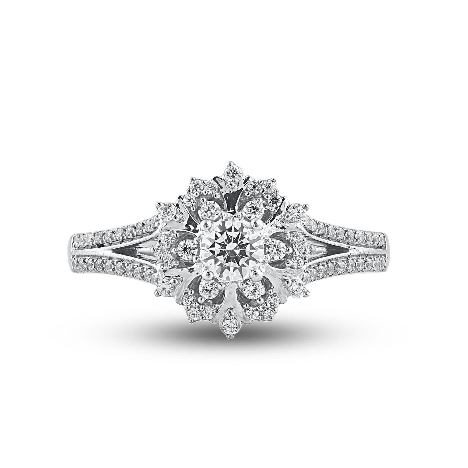 Fai una dichiarazione audace nel tuo giorno speciale indossando questo splendido anello con diamante. Splendidamente realizzato dai nostri esperti interni in oro bianco 14 carati e impreziosito da 71 diamanti rotondi a taglio brillante e taglio