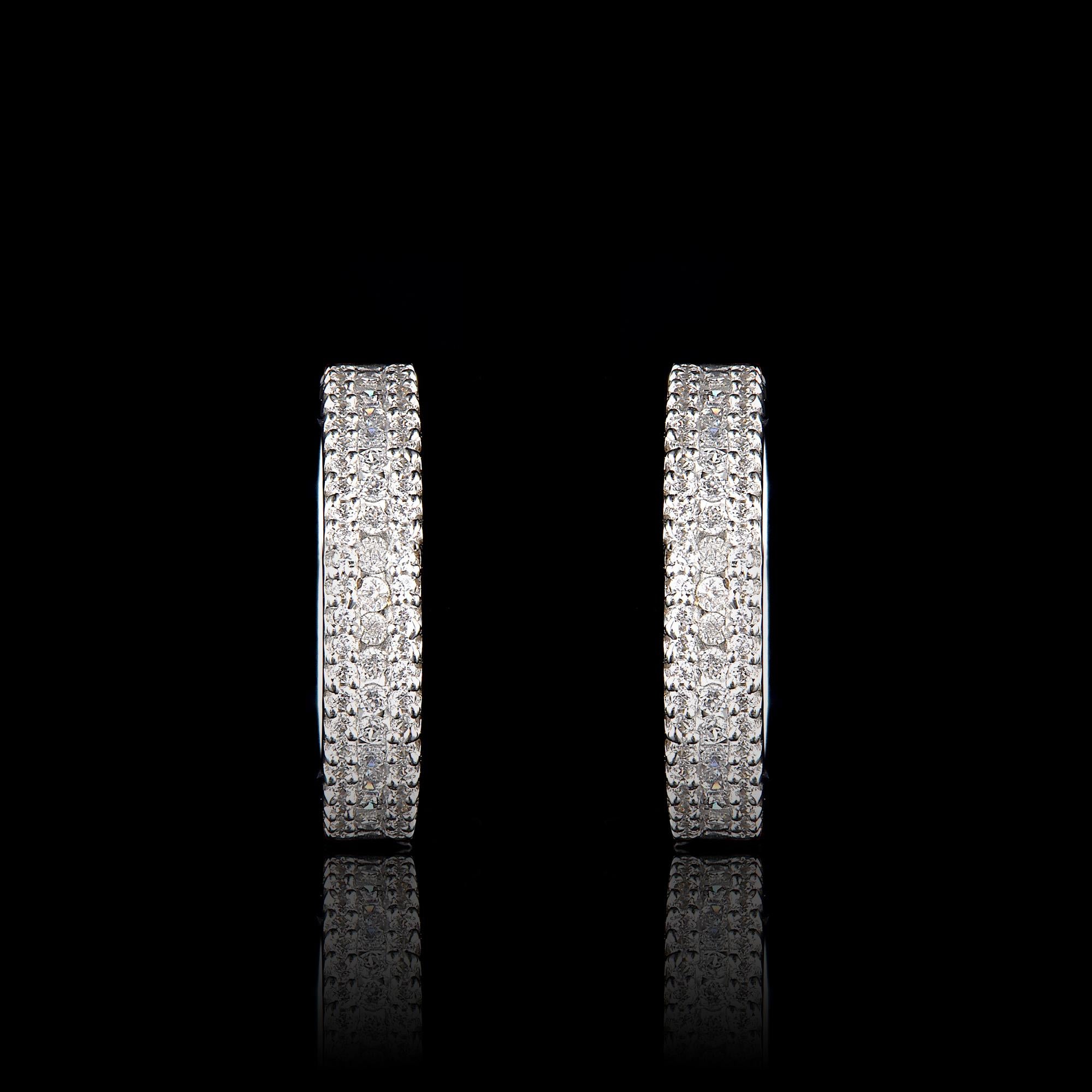 Classic and stylish diamond studded hoop earrings! perfect for daily wear. Crafted in 14 Karat white gold with 110 brilliant cut & single cut diamond in prong and channel setting. These earring secure with hinged backs. The white diamonds are graded