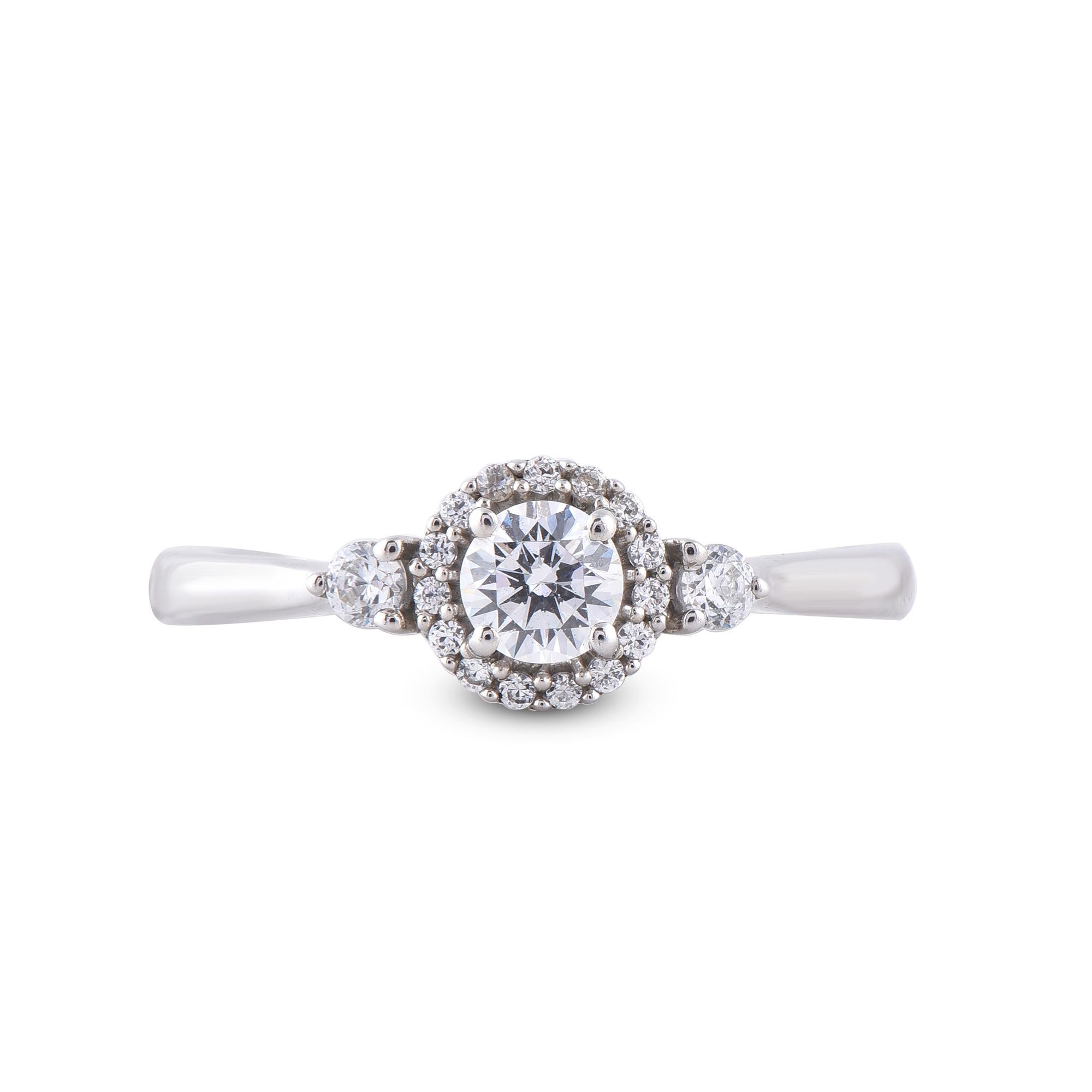 Truly exquisite, this diamond anniversary ring is sure to be admired for the inherent classic beauty and elegance within its design. These ring is crafted in 14KT white gold, and studded with 18 single cut and brilliant cut natural diamonds in prong