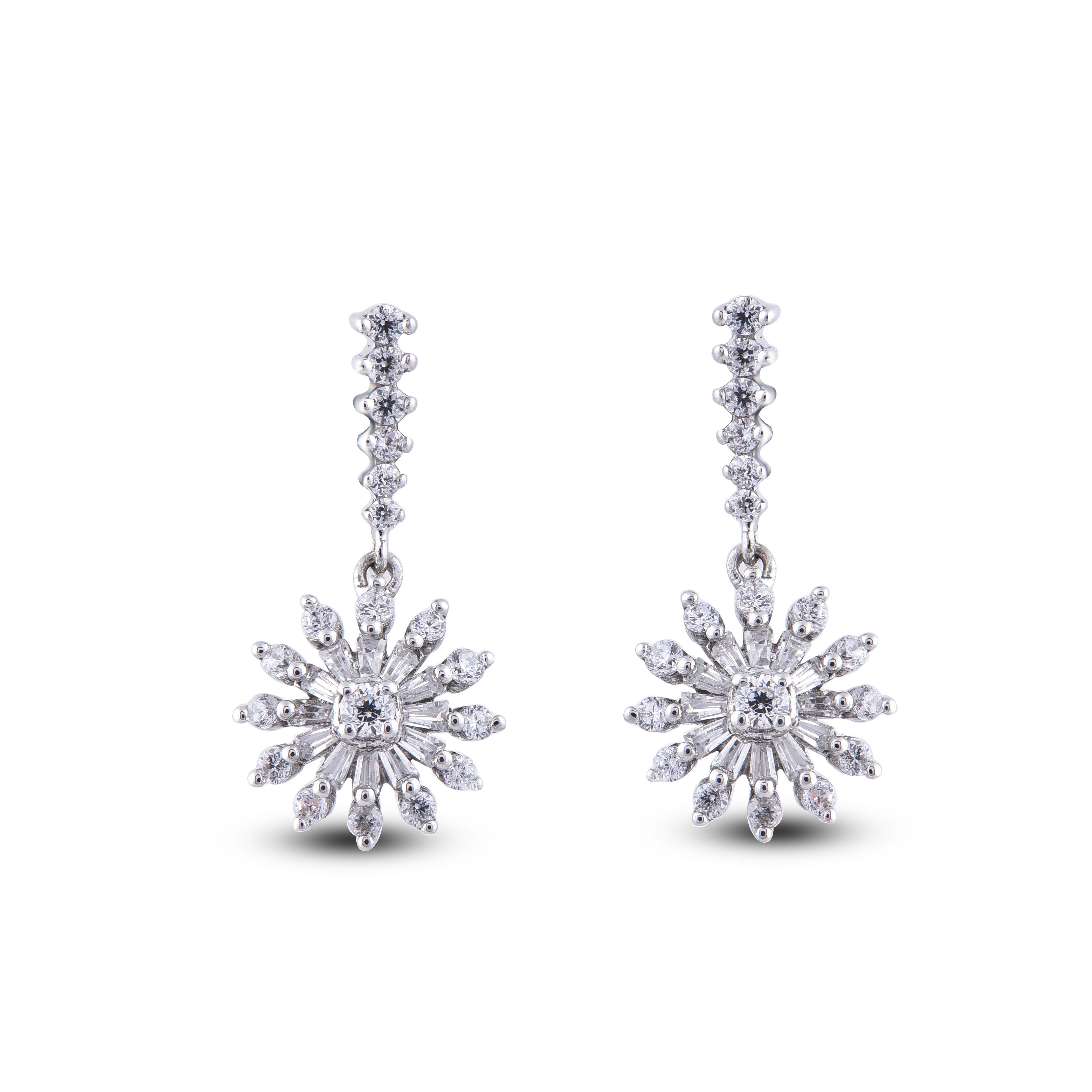 These exquisite design diamond floral drop earrings offer beauty equaled only to her own.These earrings feature 38 round and 24 baguette diamond set in prong setting and fashioned in 14 Karat White Gold. These timeless stud earrings secure
