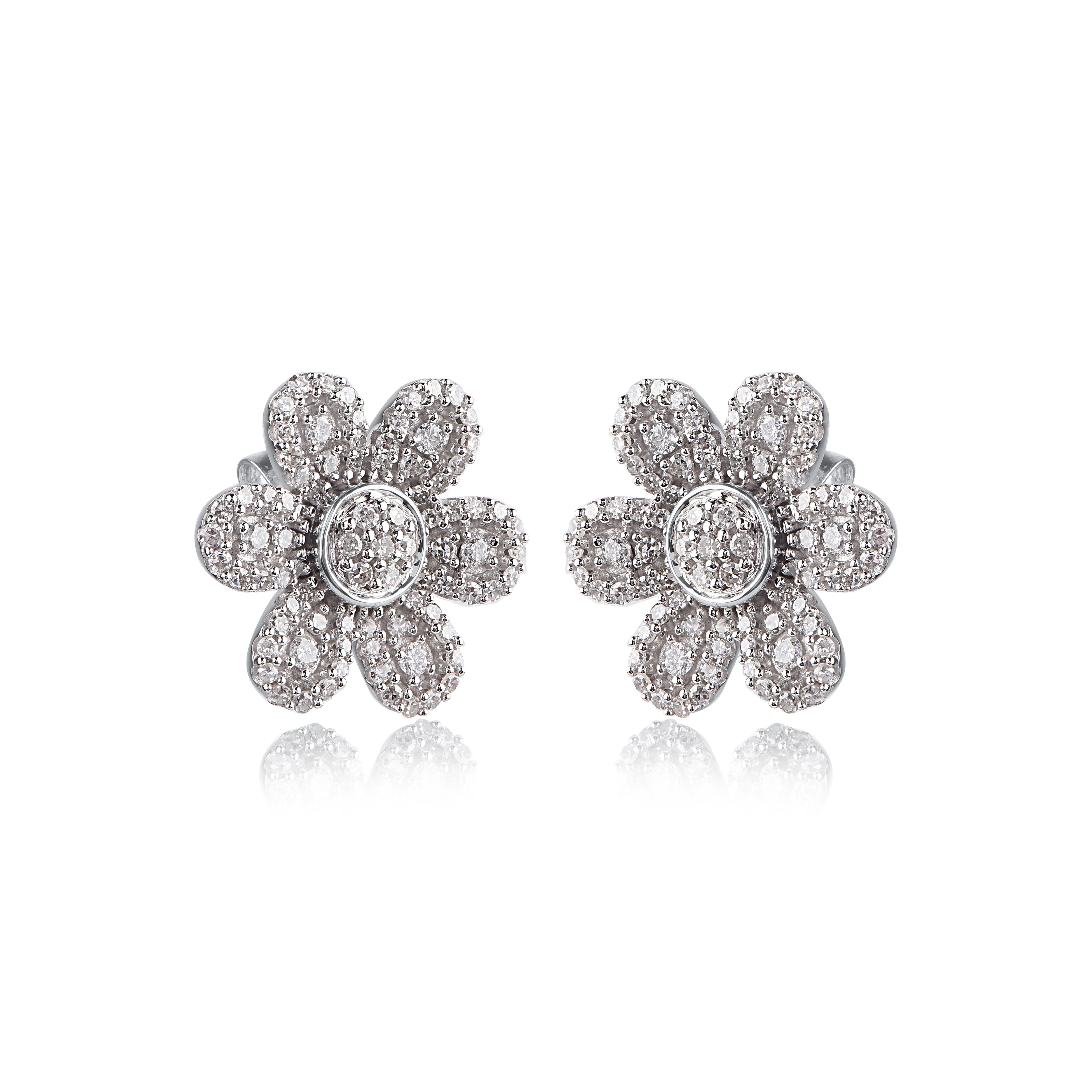Expertly crafted in 14K solid white gold, each Flower shaped earring is cleverly filled with 170 round diamond set in pave and stackable prong setting, H-I color I2 clarity. Captivating with 0.50 carats diamonds and a bright polished shine, these