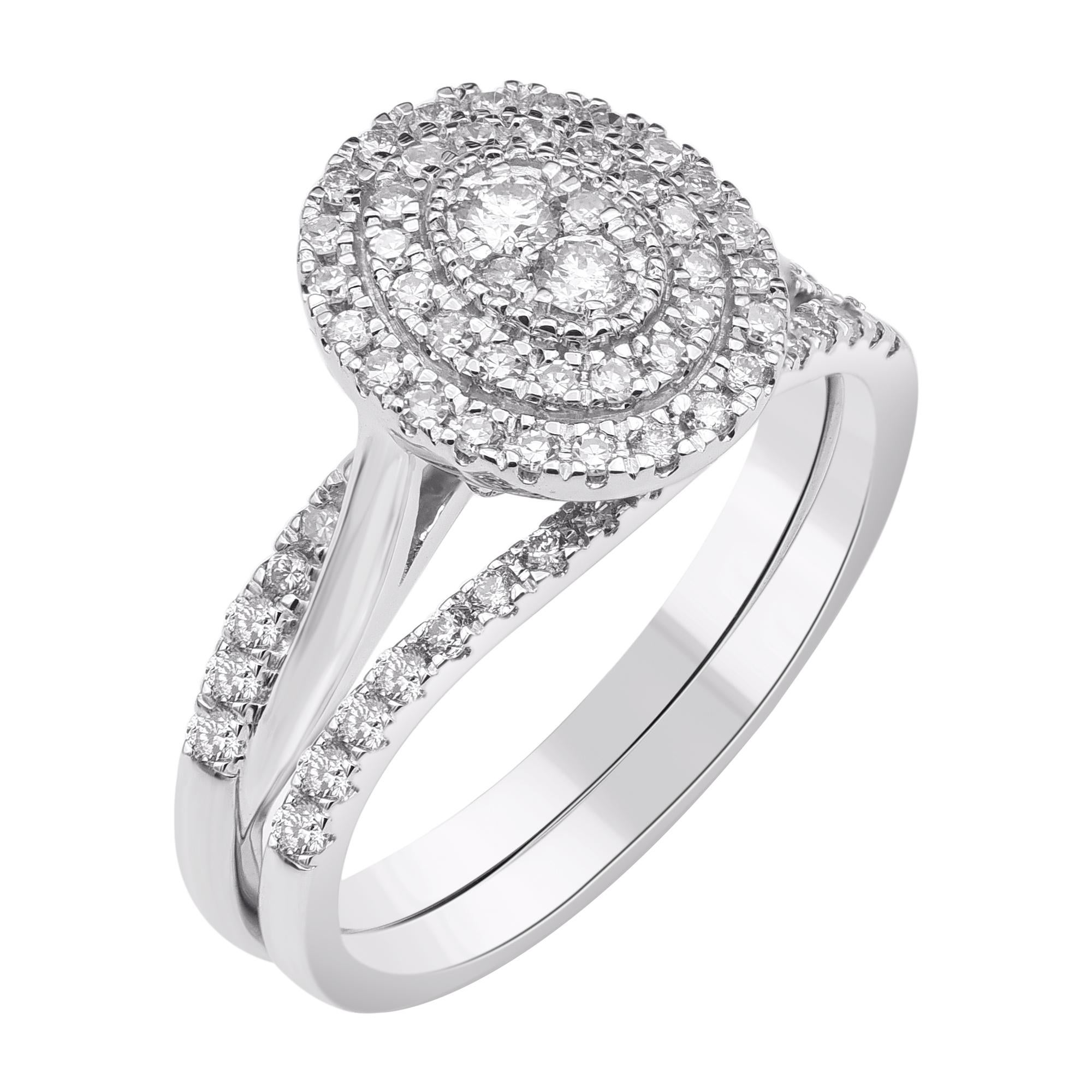 Express your love with this classic and dazzling diamond bridal set. Crafted in 14 Karat white gold. This wedding ring features a sparkling 69 brilliant cut and single cut diamonds beautifully set in prong & pave setting. The total diamond weight is