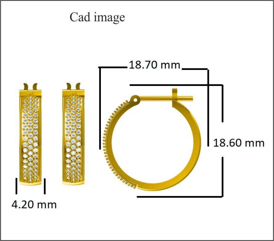 These exquisite diamond hoop earrings offer beauty equaled only to her own. These earrings crafted in 14 karat in yellow gold and features 98 round dazzling diamond set in prong setting, and shines brightly in H-I color I2 clarity. These timeless