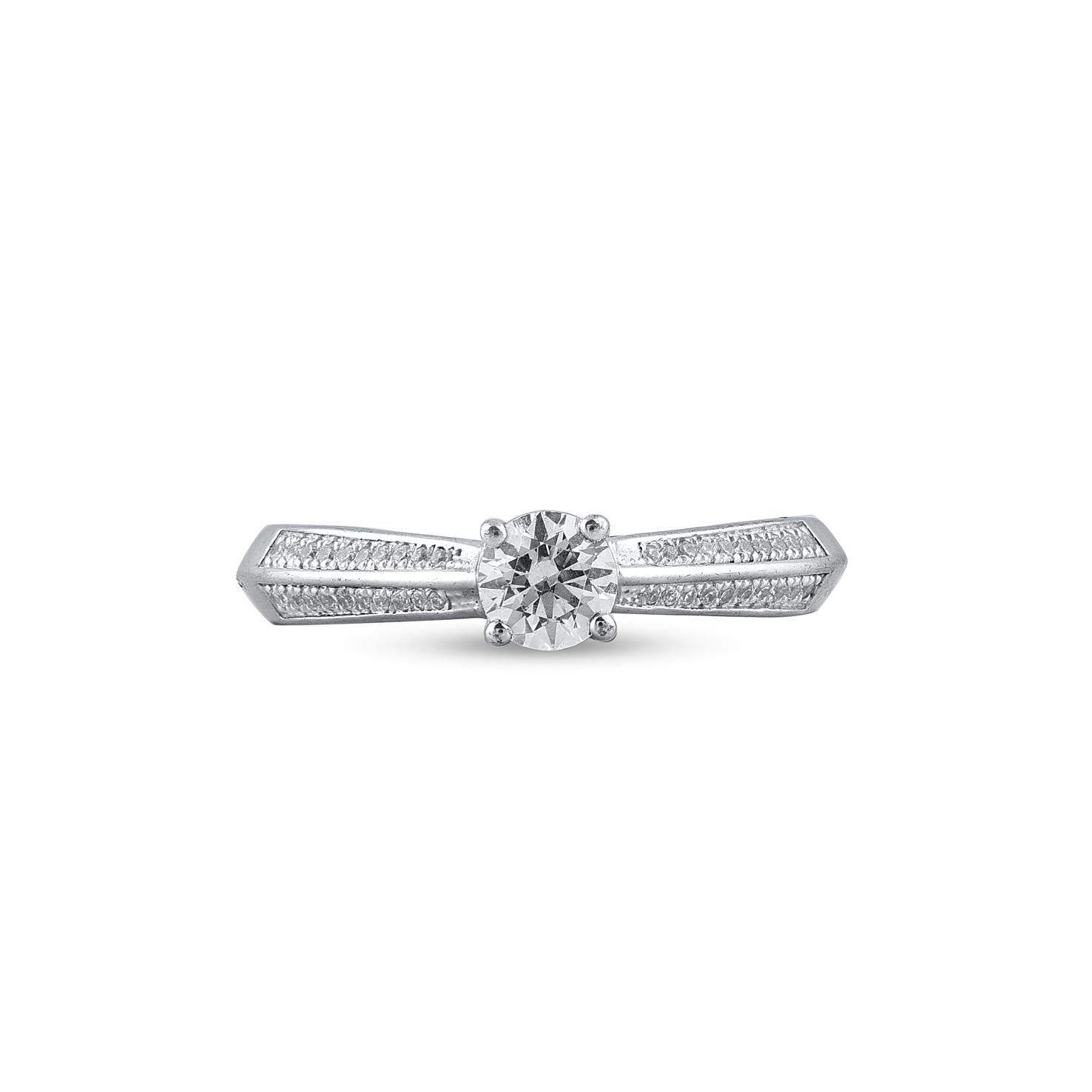 Express your love for her in the most classic way with this diamond ring. Beautifully crafted by our inhouse experts in 14 karat white gold and embellished with 41 brilliant cut and single cut round diamond set in prong and pave setting. Total