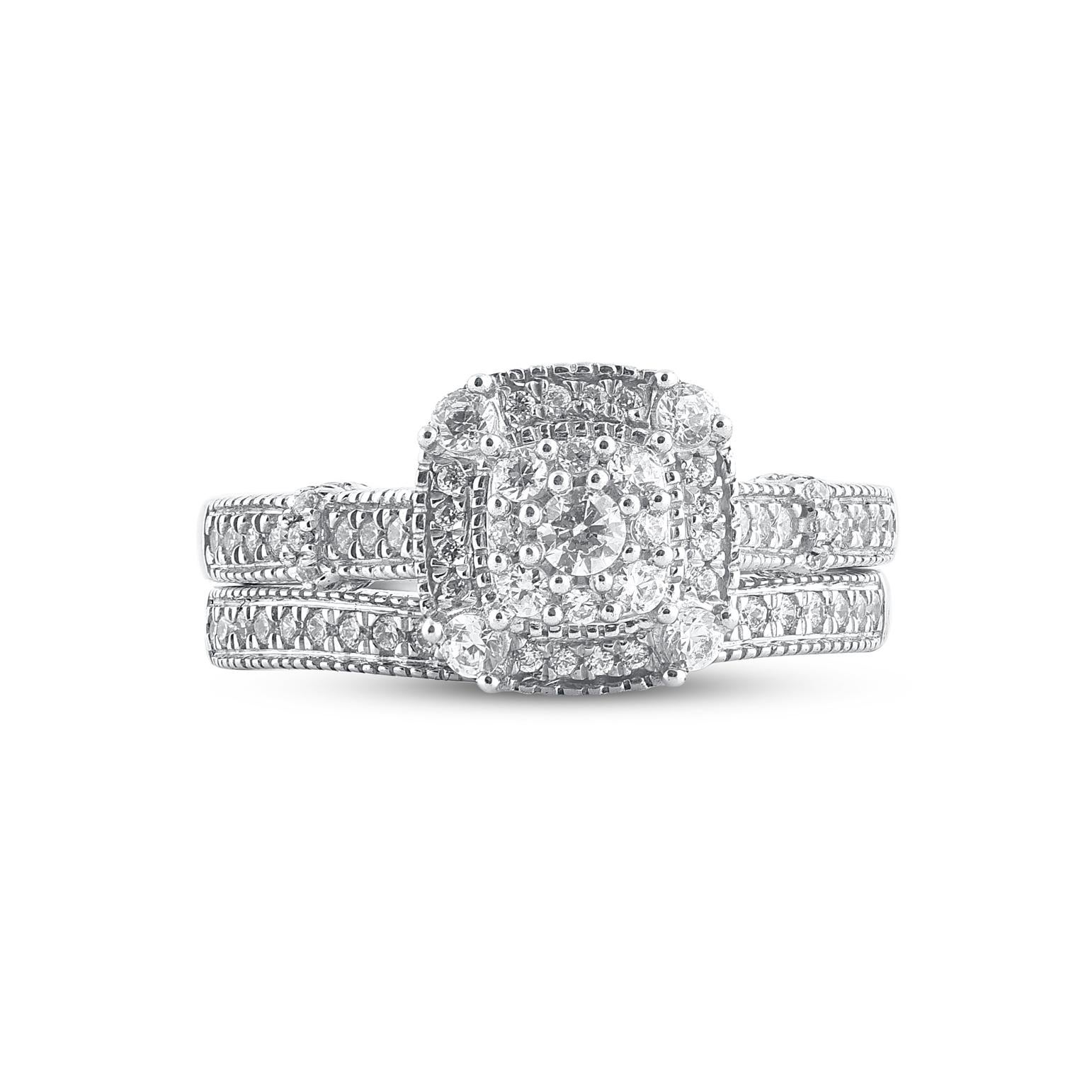 Give her a sophisticated reminder of your love with this diamond ring set. Crafted in 14 Karat white gold. This wedding ring features a sparkling 75 brilliant cut and single cut round diamonds beautifully set in prong and pave setting. The total