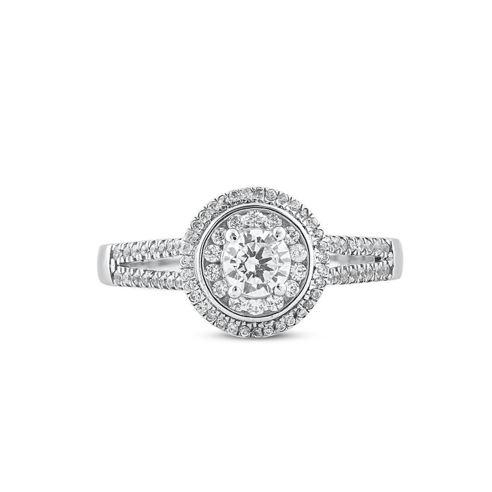 Make lifelong memory with this enticing cluster diamond fashion ring. expertly crafted in 14 Karat white gold and shines with 82 brilliant cut and single cut diamond in prong and channel setting. The total weight of diamonds 0.66 carat, H-I color