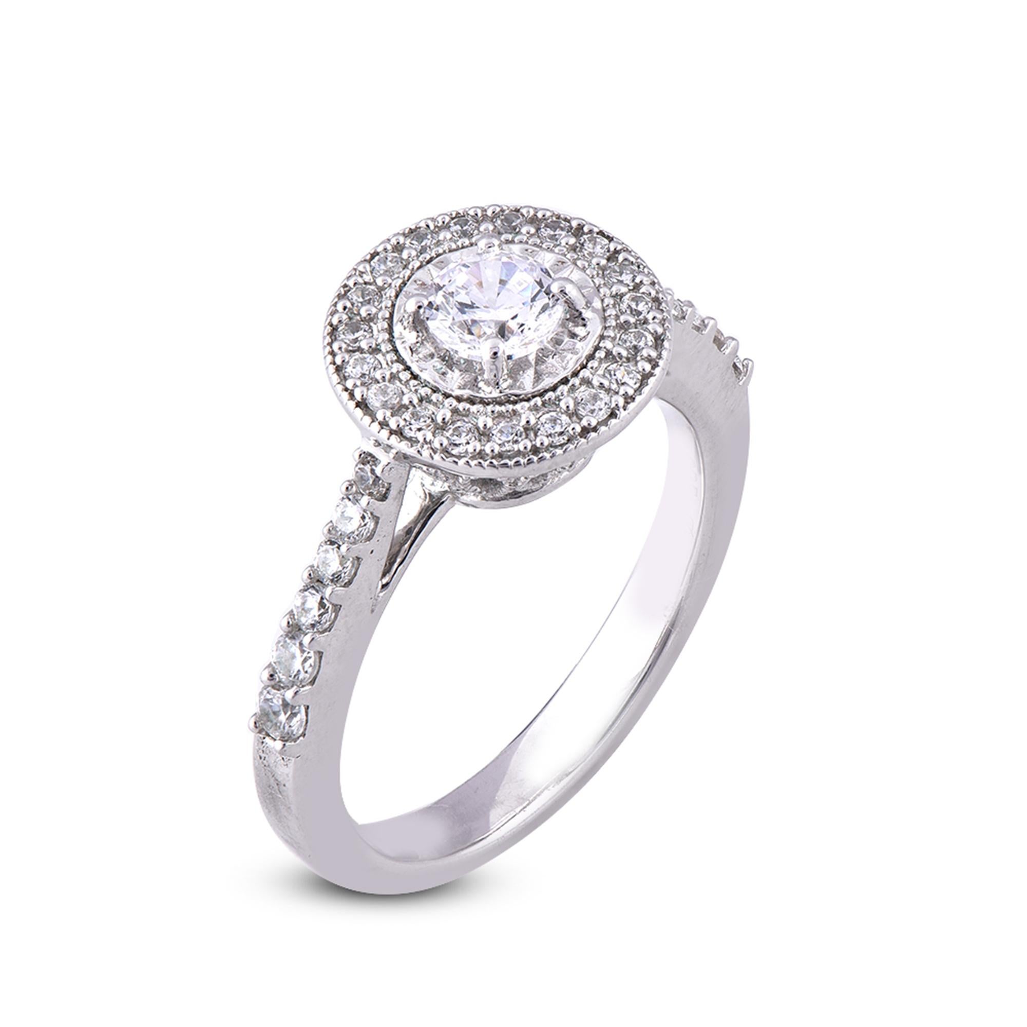 This diamond engagement ring is expertly crafted in 18 Karat White Gold and features 0.32 ct centre stone and 0.34 ct of diamond frame and shank lined diamonds set in prong setting. The diamond are natural, not treated and dazzles in G-H color SI1-2