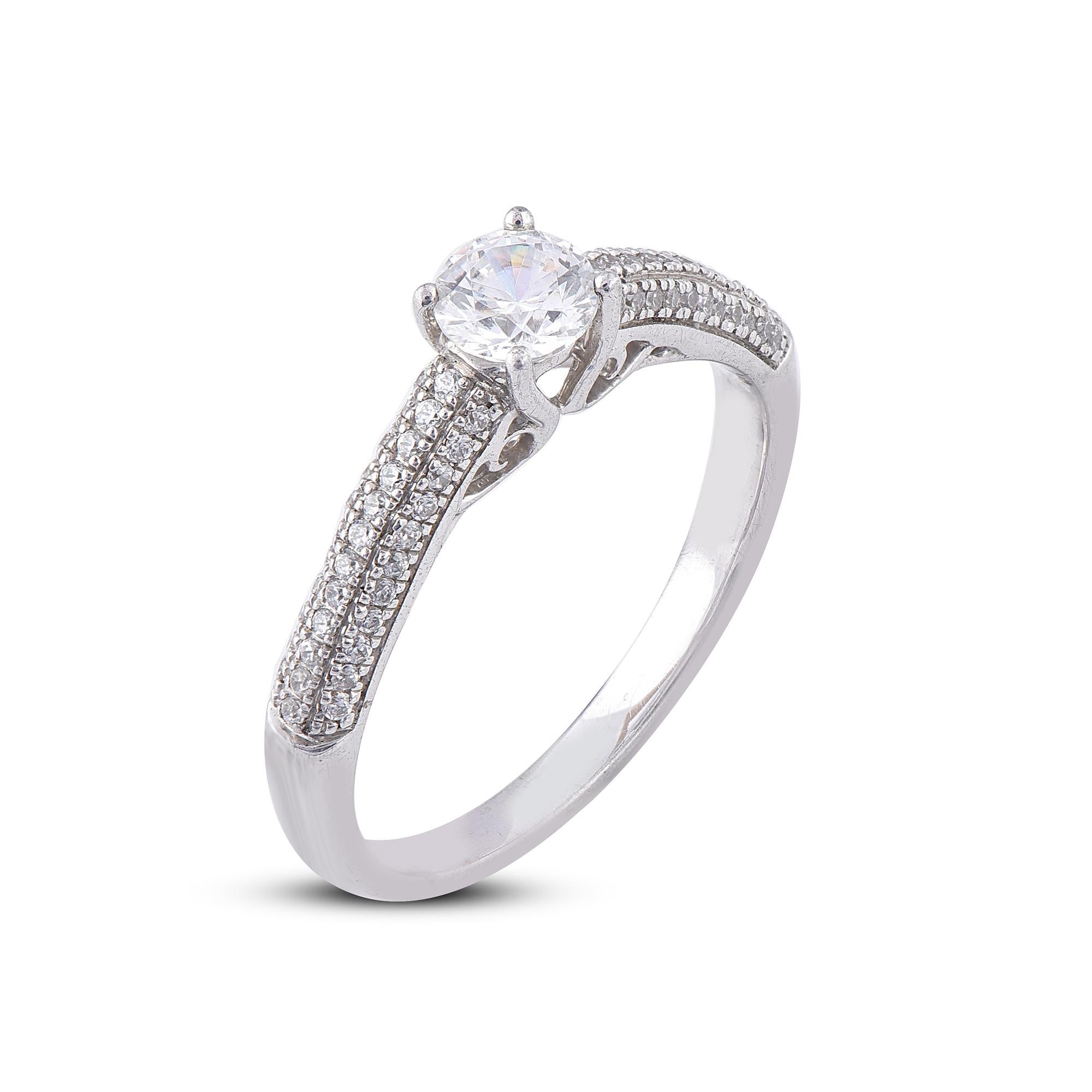 Sparkling with all your wonderful moments, this diamond engagement ring is shining symbol of your commitment. Crafted in 18 karat white gold, this engagement ring features 0.38 ct centre stone and 0.28 ct of diamond on shank lined set with 69 round