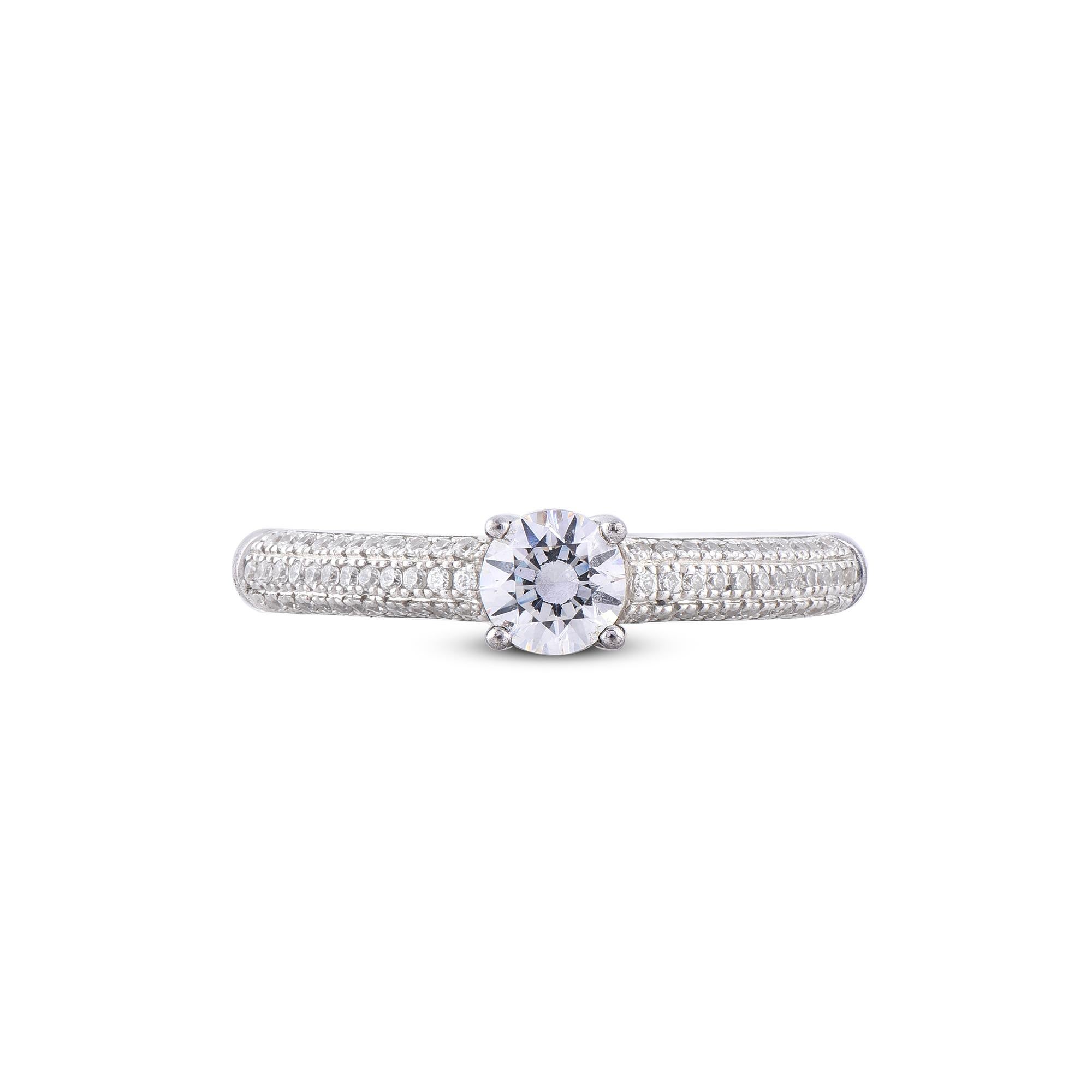 A graceful addition to her wardrobe, this design crafted in 14 Karat white gold and it's features 69 round brilliant cut and single cut diamond set in prong setting. Total diamond weight is 0.66 carat. The diamond are natural, not treated and
