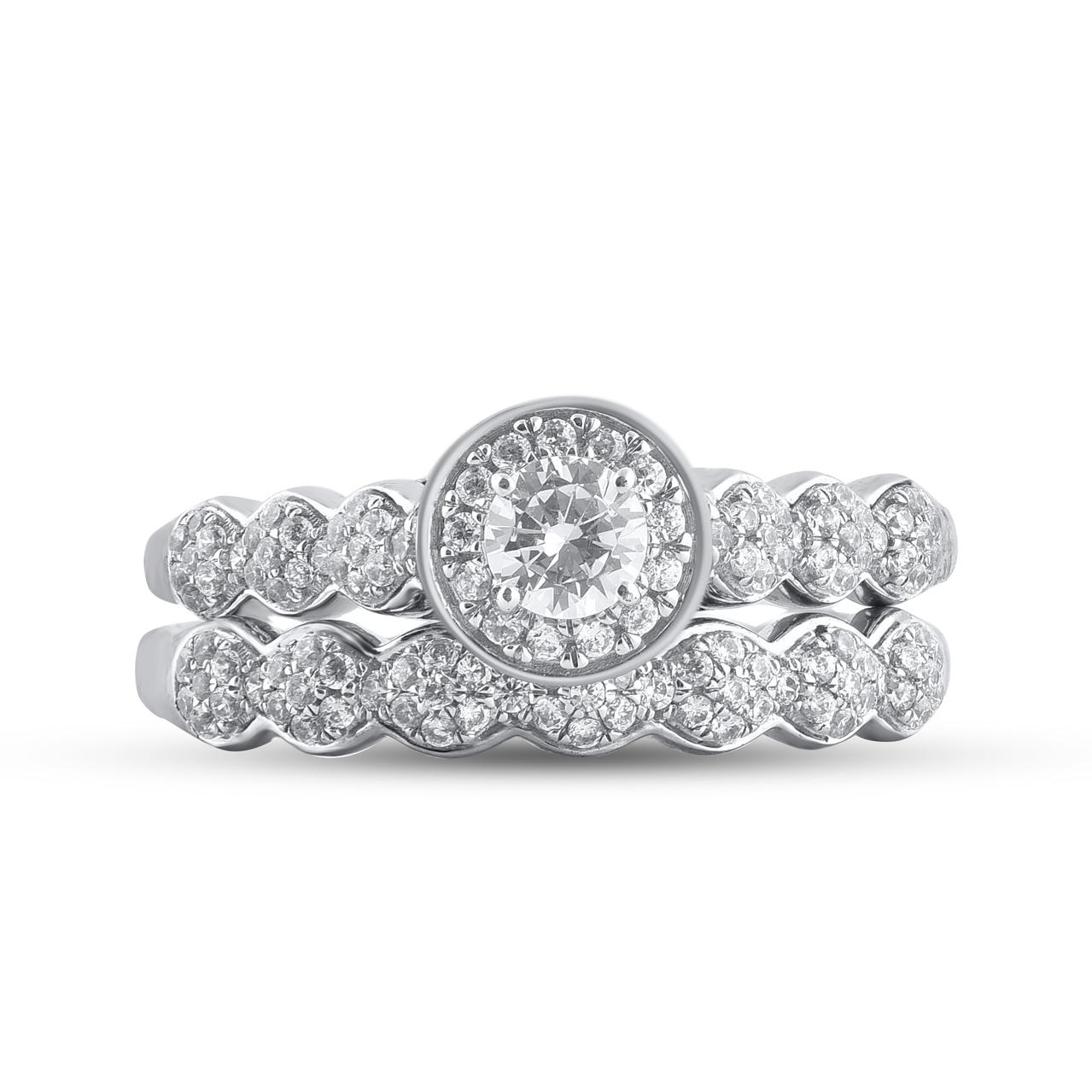 Express your everlasting love with this exceptional diamond bridal ring set. Crafted in 14 Karat white gold. This wedding ring features a sparkling 117 single cut and brilliant cut round diamonds beautifully set in prong & pave setting. The total