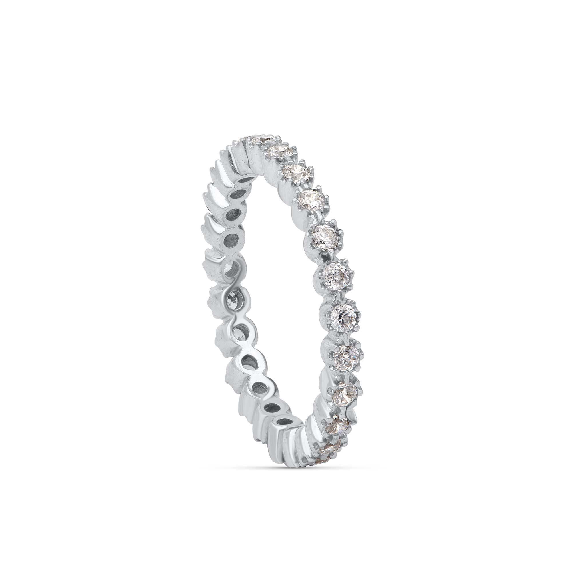 Scintillating with 25 brilliant diamonds beautifully set in prong setting and designed in 18-karat white gold. Diamonds are graded H-I Color, I2 Clarity. 

Metal color and ring size can be customized on request. 

This piece is made to order. Please